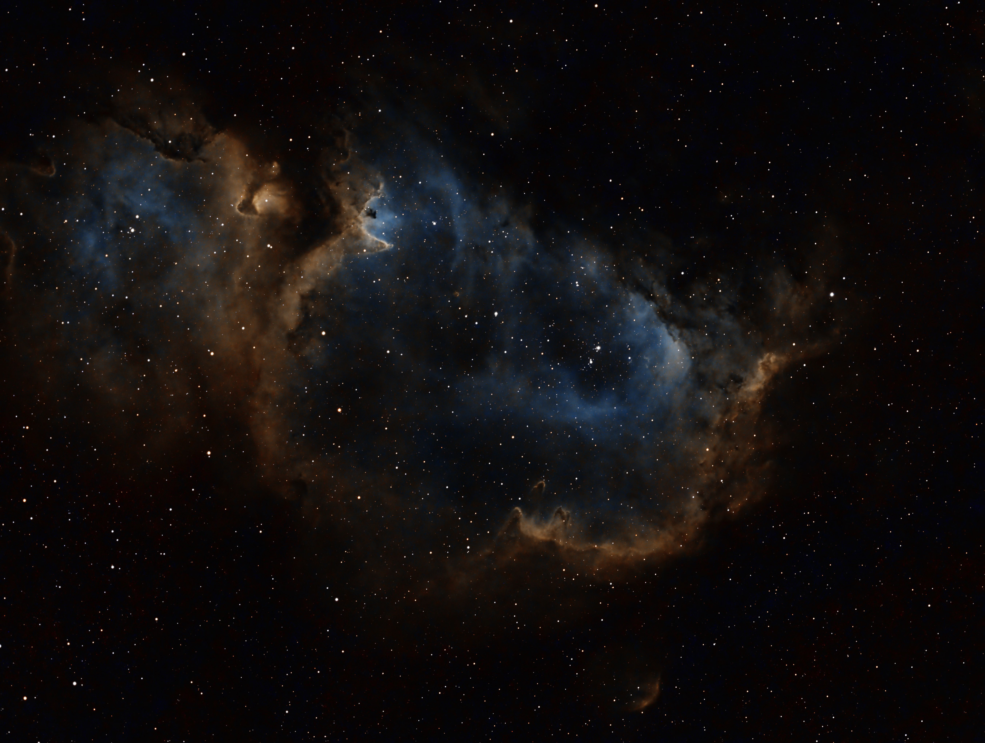 The Soul Nebula is sometimes also known as the Embryo Nebula or IC 1848. Located in Cassiopeia, it is about 6,500 light years away and about 150 light years across sharing the sky with its neighbor The Heart Nebula.
