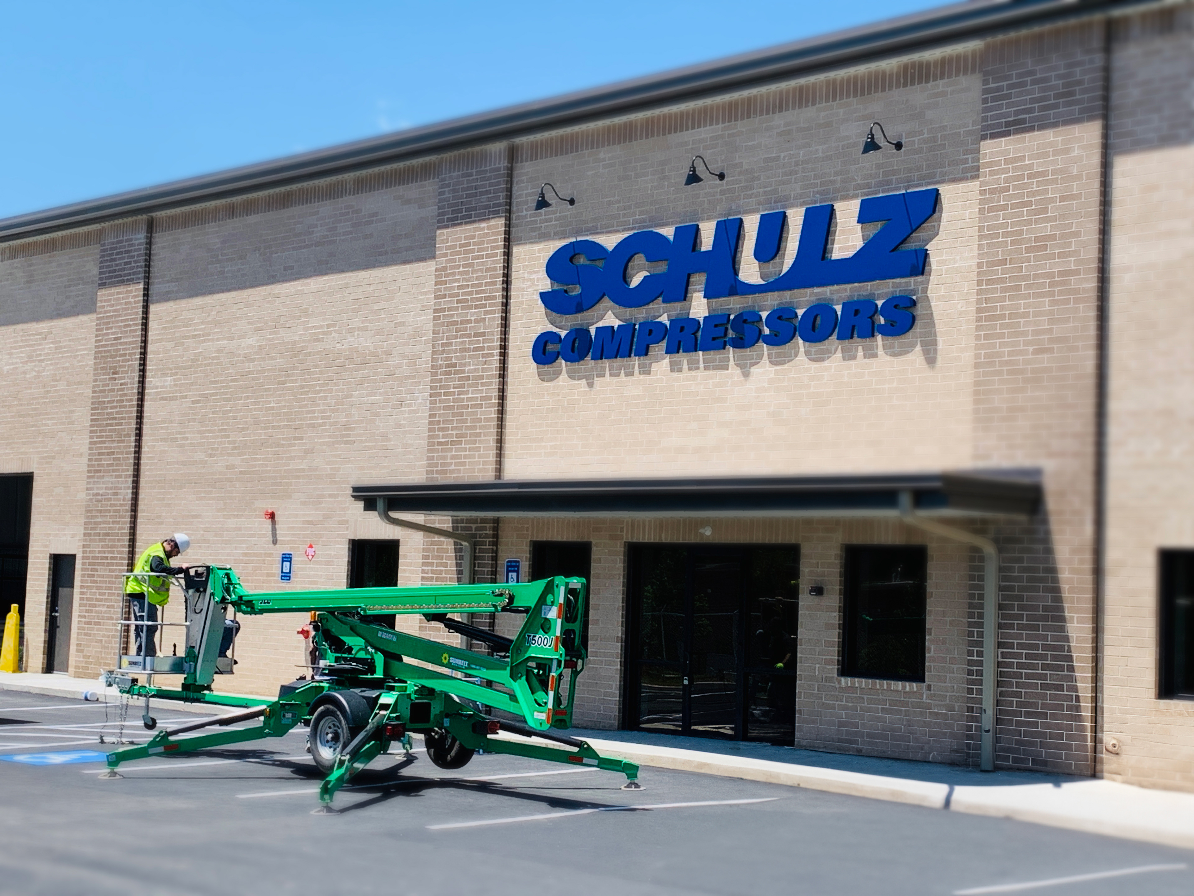 Marvel at how the front office sign comes to life in the daylight, a shining example of S2dm Graphic Design's ability to create signage that not only identifies but elevates the essence of the brand.