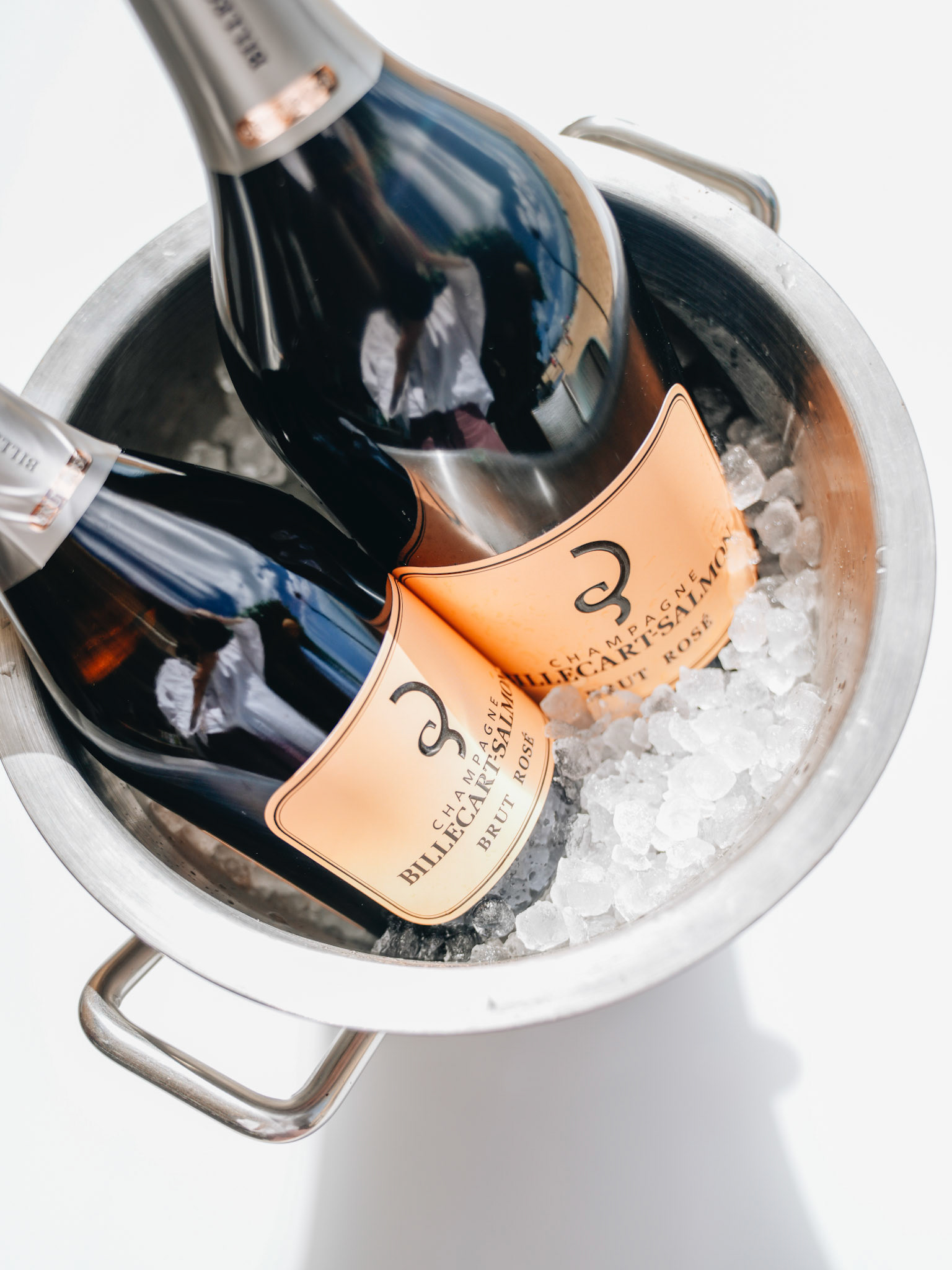 Two Champagne Bottles in Ice Bucket