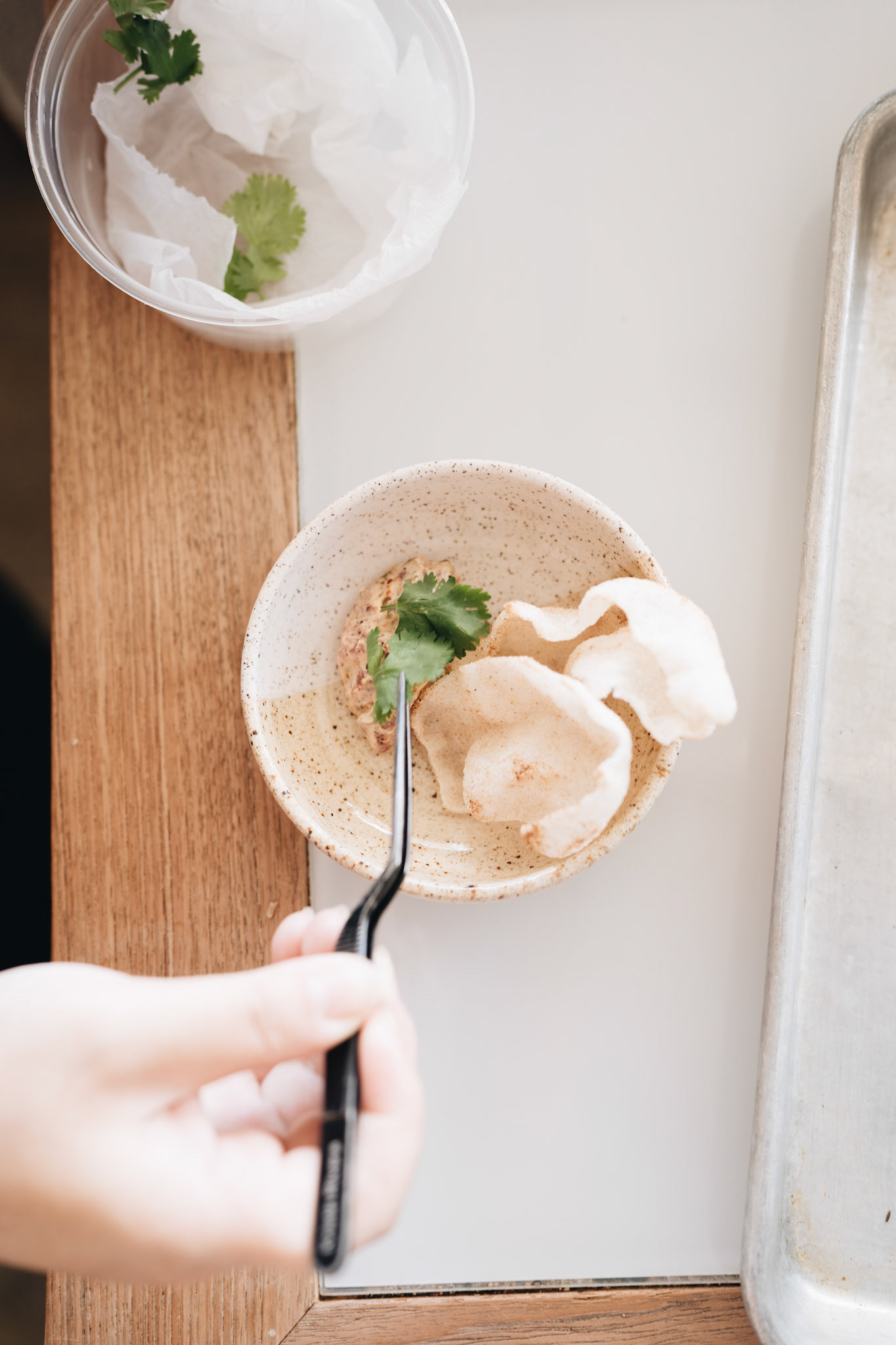 Adding Cilantro Garnish to Food