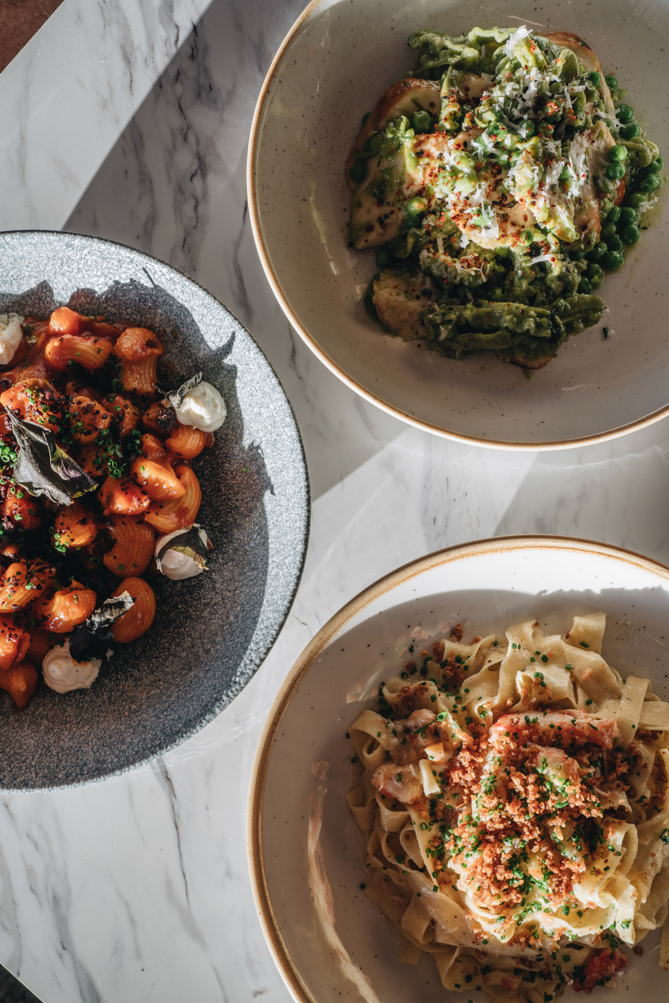 Three Bowls of Pasta Dishes