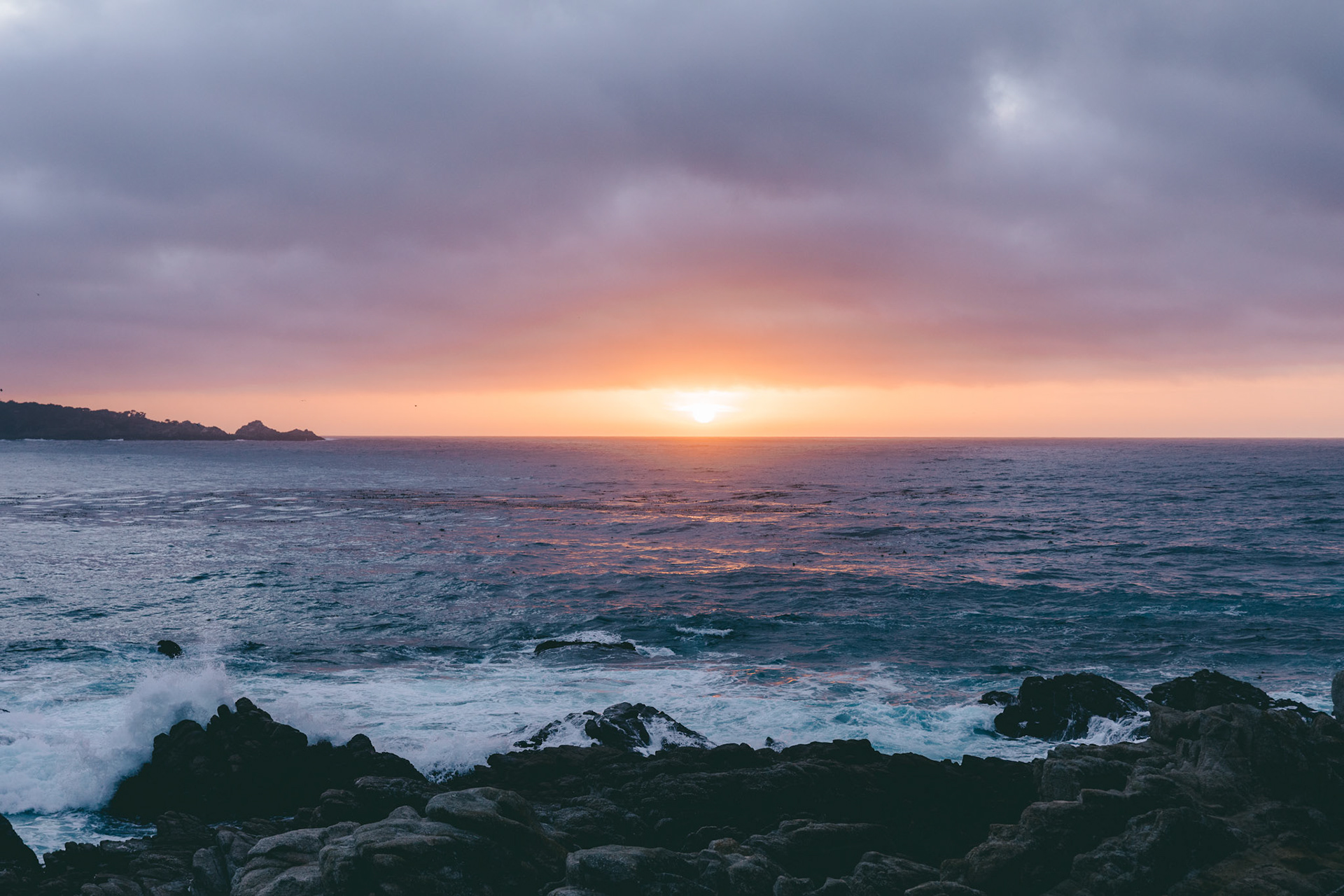 SunsetOver Ocean with Rocks