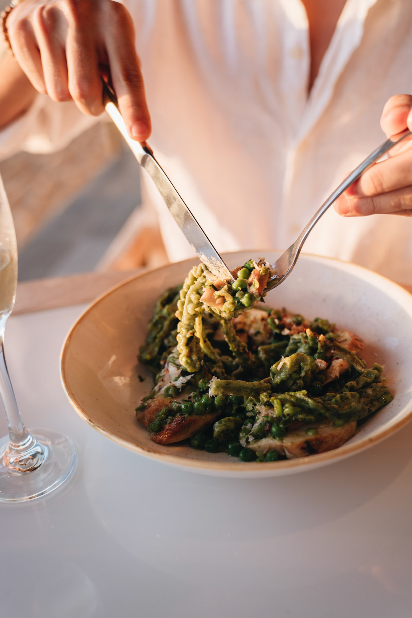 Eating Green Pasta with Fish