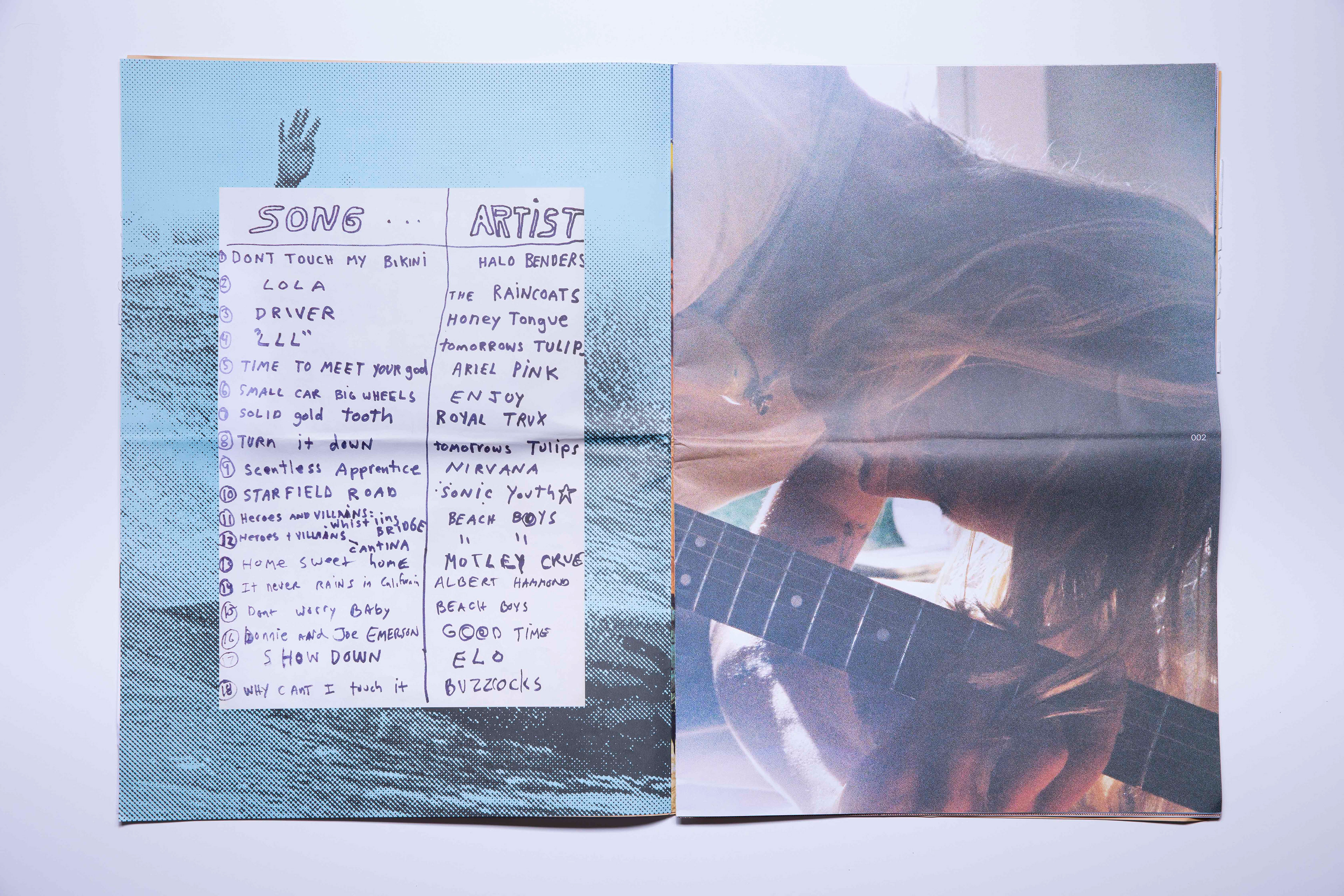 Spread from Vans surf zine with playlist