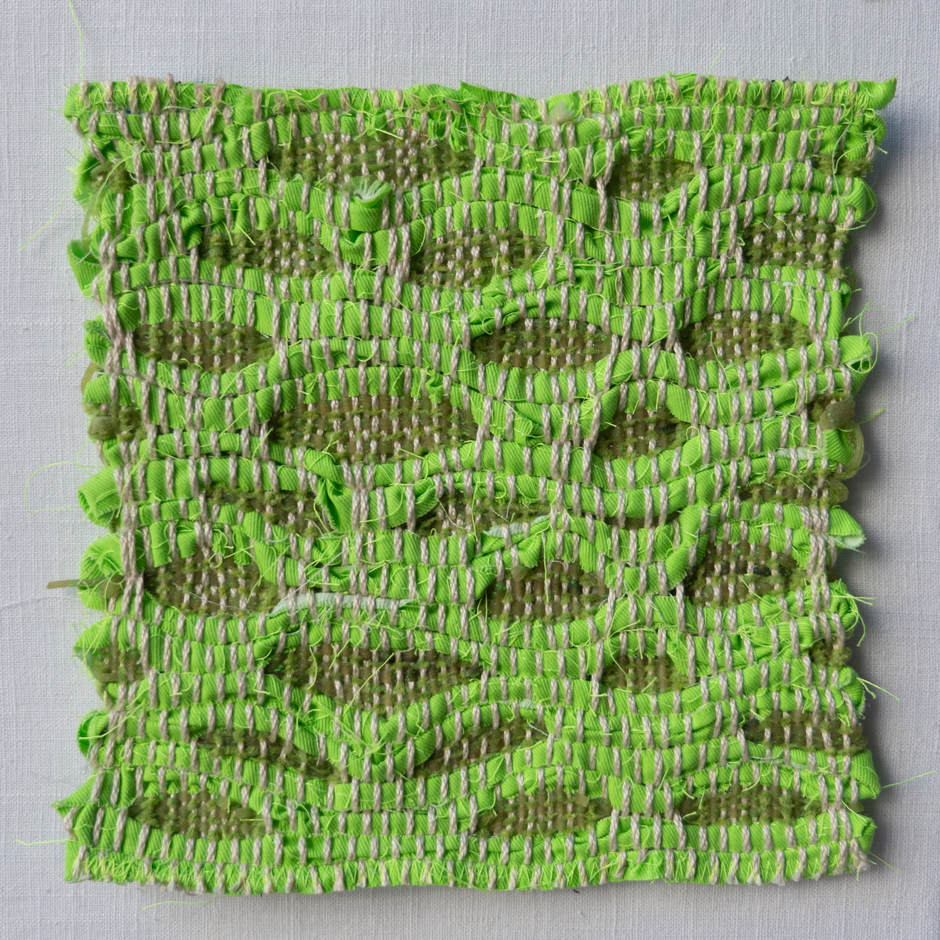 honeycomb with glowing bioplastic yarn and recycled denim weft
