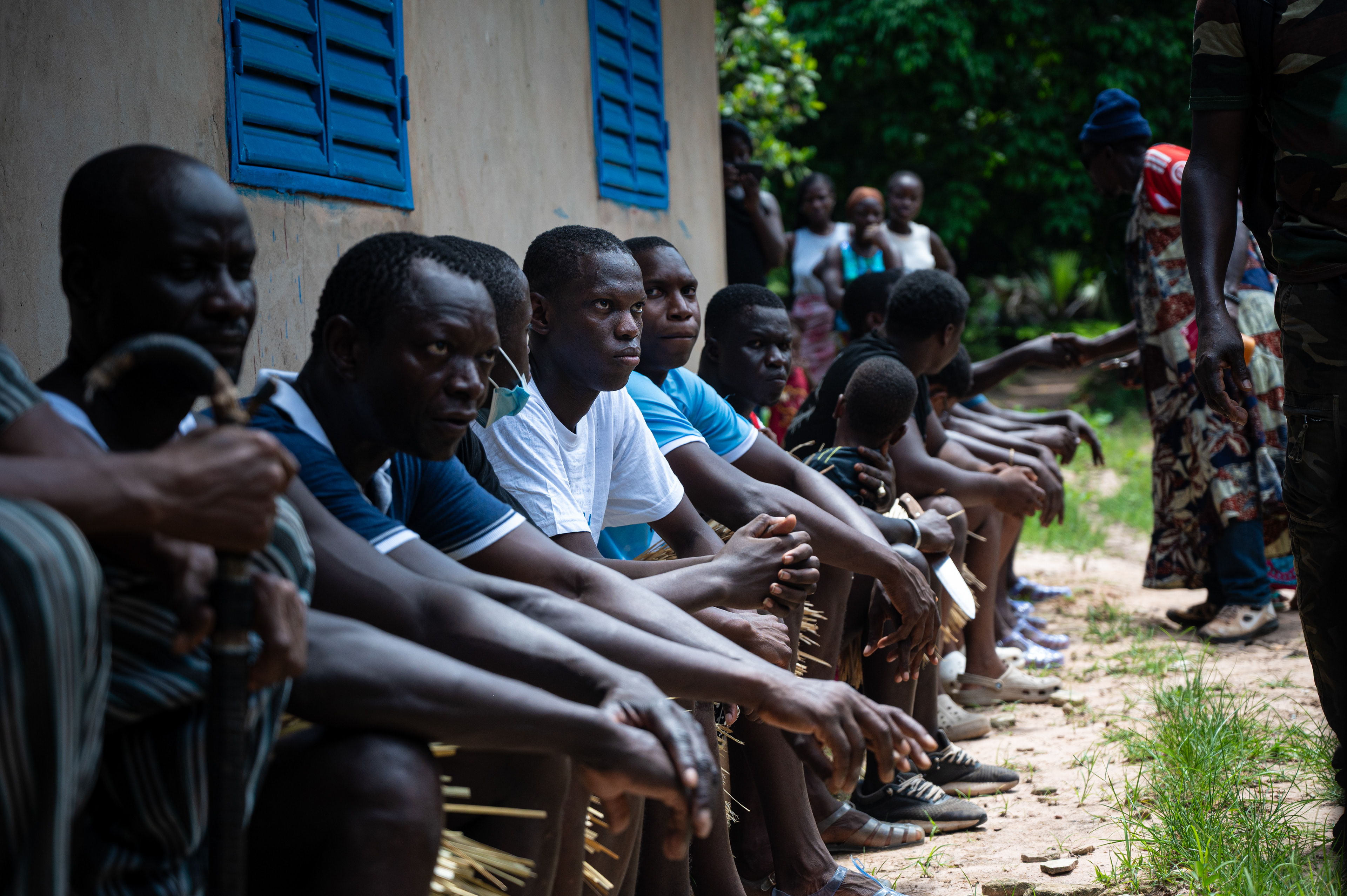 Diola novices waiting for elders indications at the Boukout ceremonies in Sengalene village, Casamance region, Senegal. August 22, 2026.