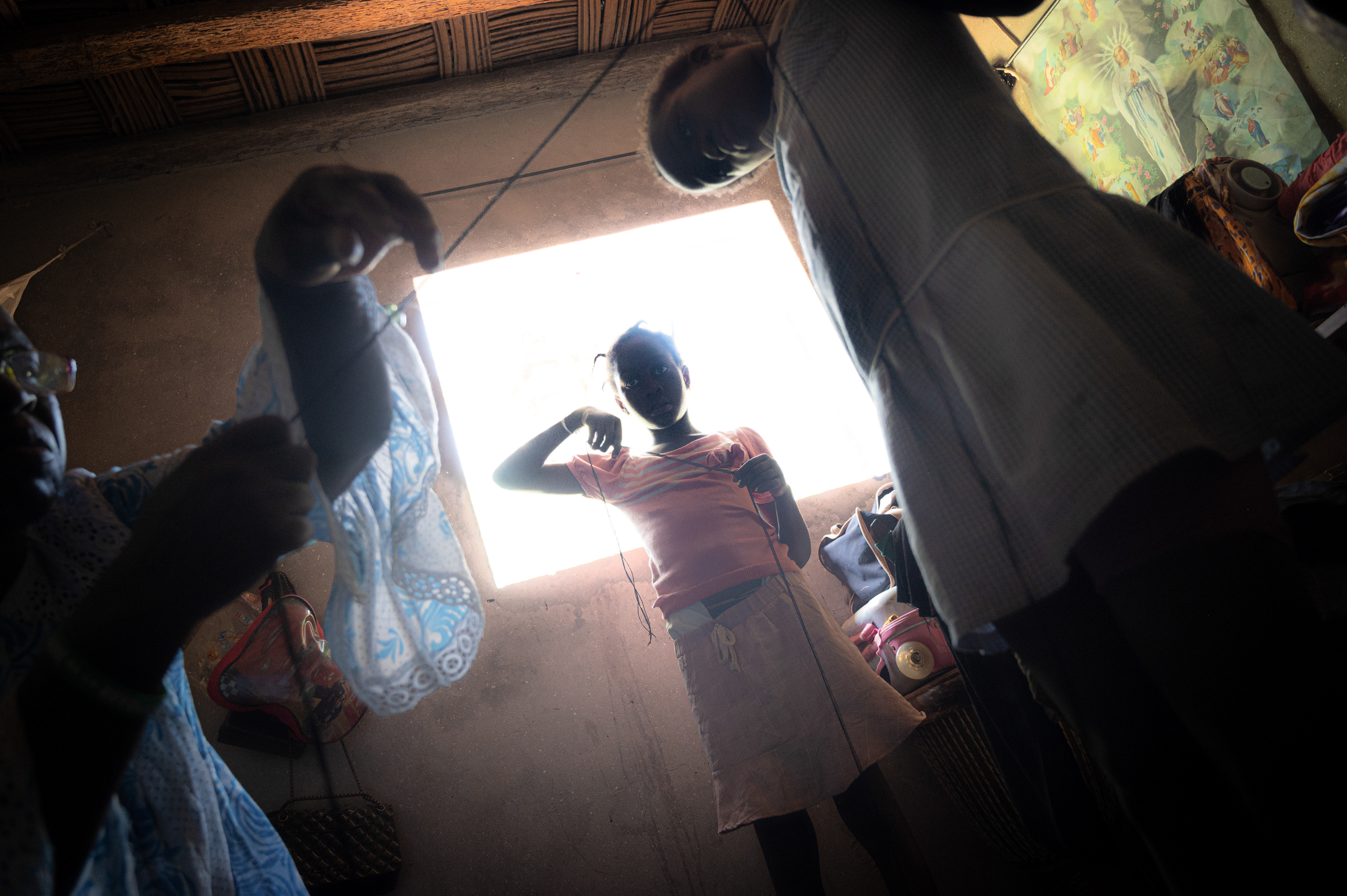 Preparation of the ‘basis’ – traditional pearl necklaces – by the village women to adorn the men as they leave the sacred forest during the Boukout ceremony in Sengalene village, Casamance region, Senegal. August 12, 2026.