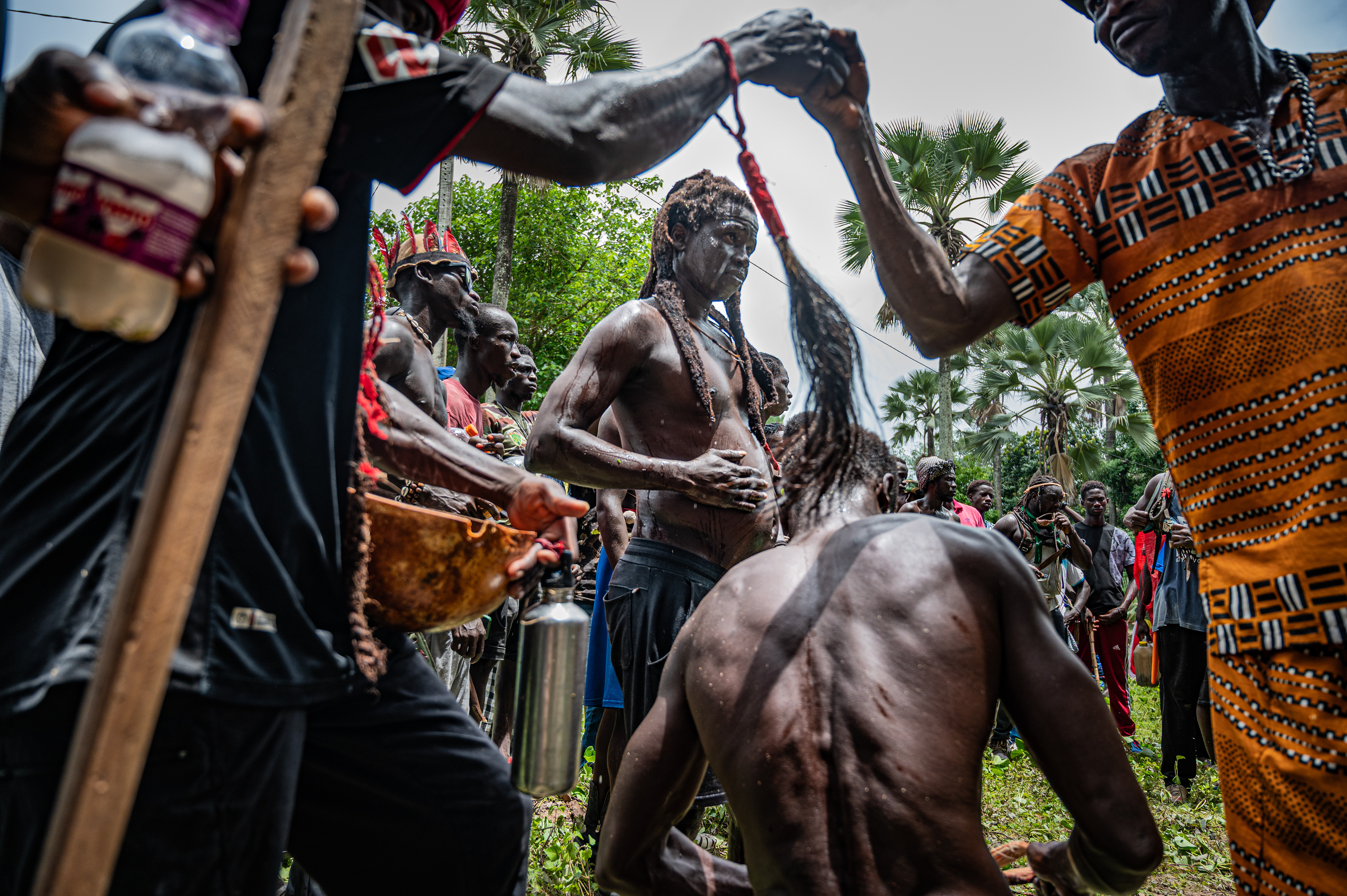 Men gather to celebrate the entry of novices into the sacred forest during the Boukout ritual in Sengalene village, Casamance region, Senegal. August 5, 2026.