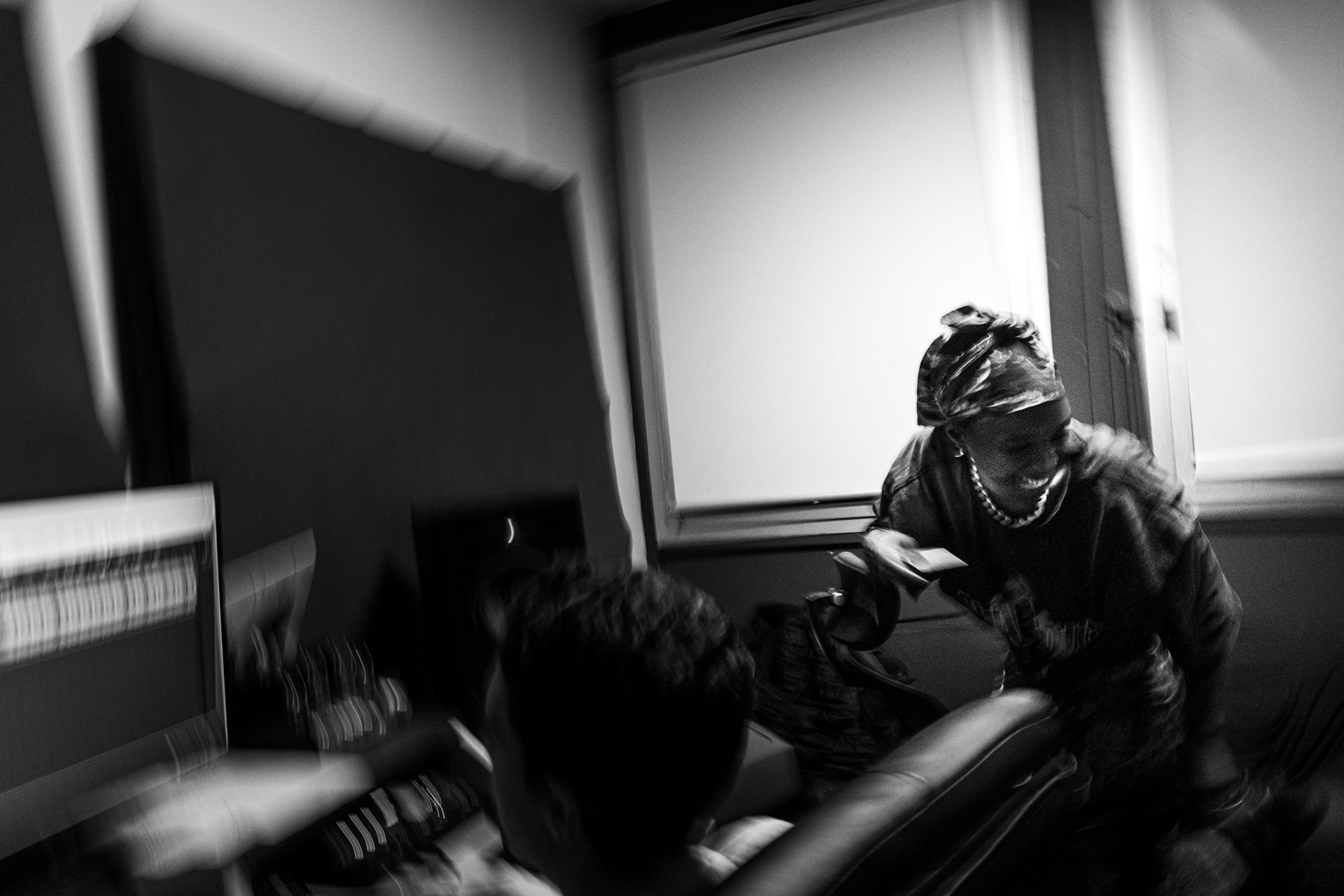 Aimé Césaire Socio-Cultural Centre, Paris. January 18th 2026. Rose Oyemi vibing in the recording studio while preparing a song featuring Maim, a french female rapper regular at the collective.