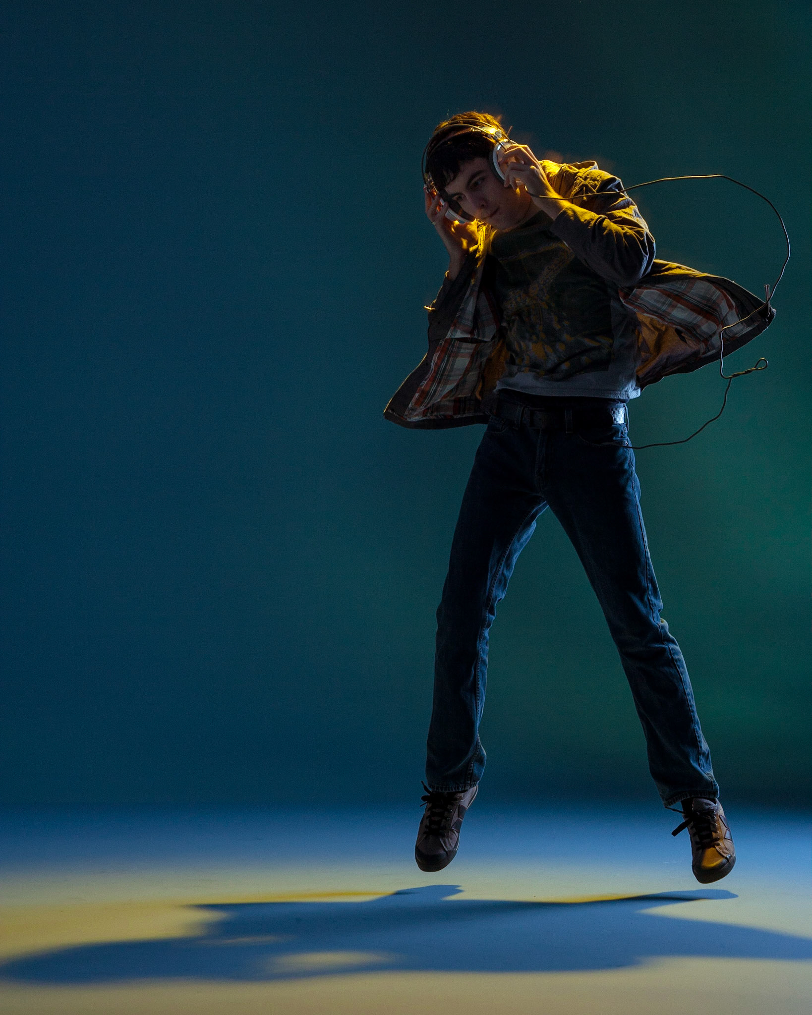 A studio photo to illustrate the intense connection of teens to their music.