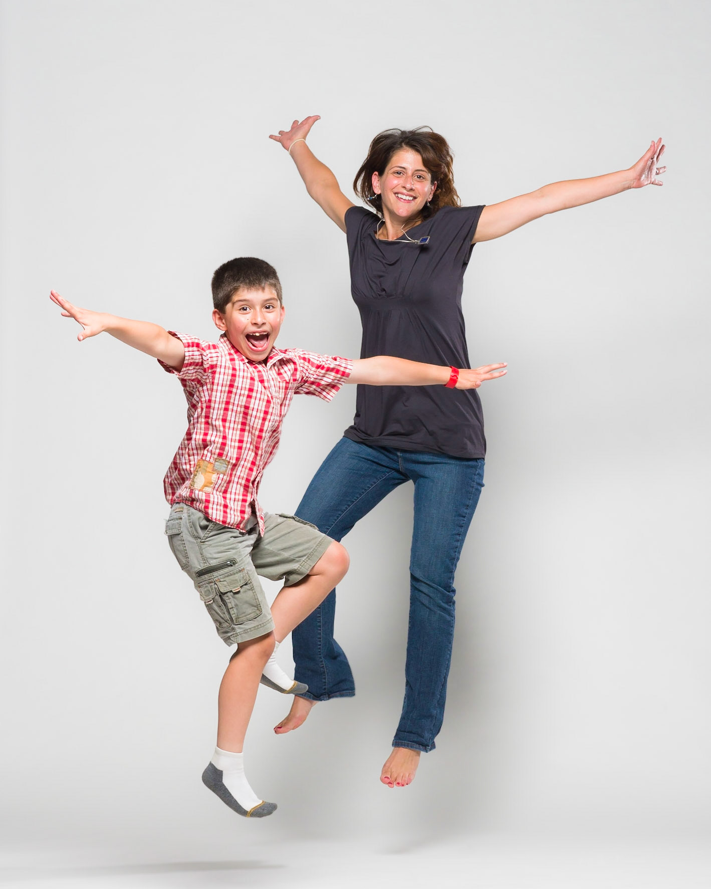 Mother & Son Jump With Joy