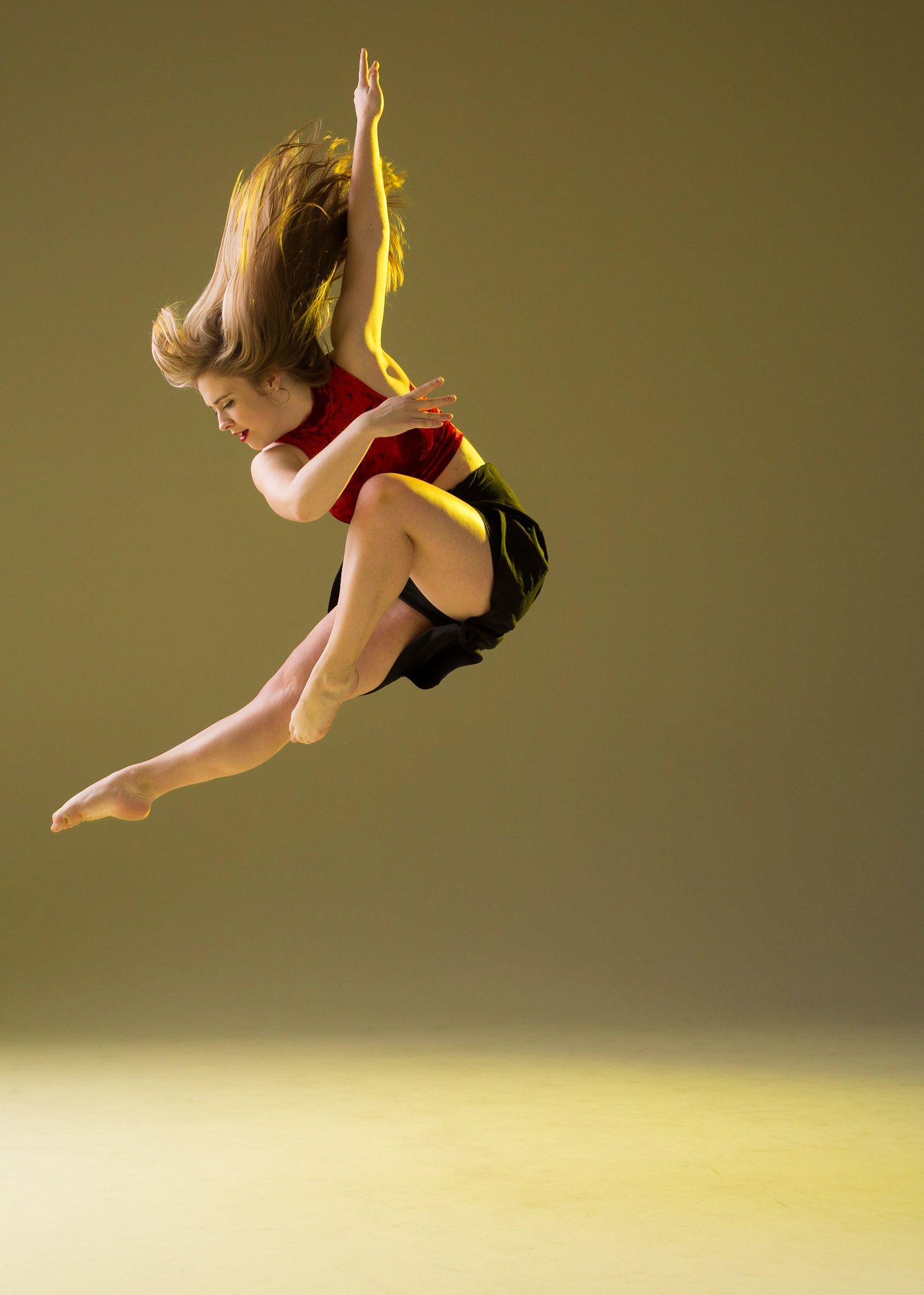 A Dancer Soars Through The Light