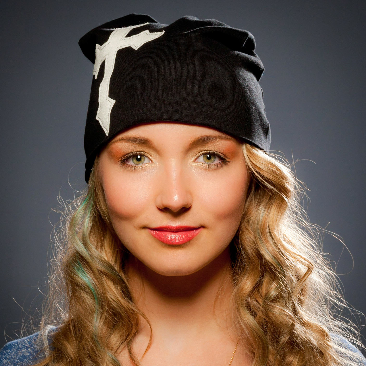 Editorial shot commissioned for an article about fashion designer, Lexy Charms by the Rockford Indie Press. The model here was donning a modern take on a more classic Jacobin cap.