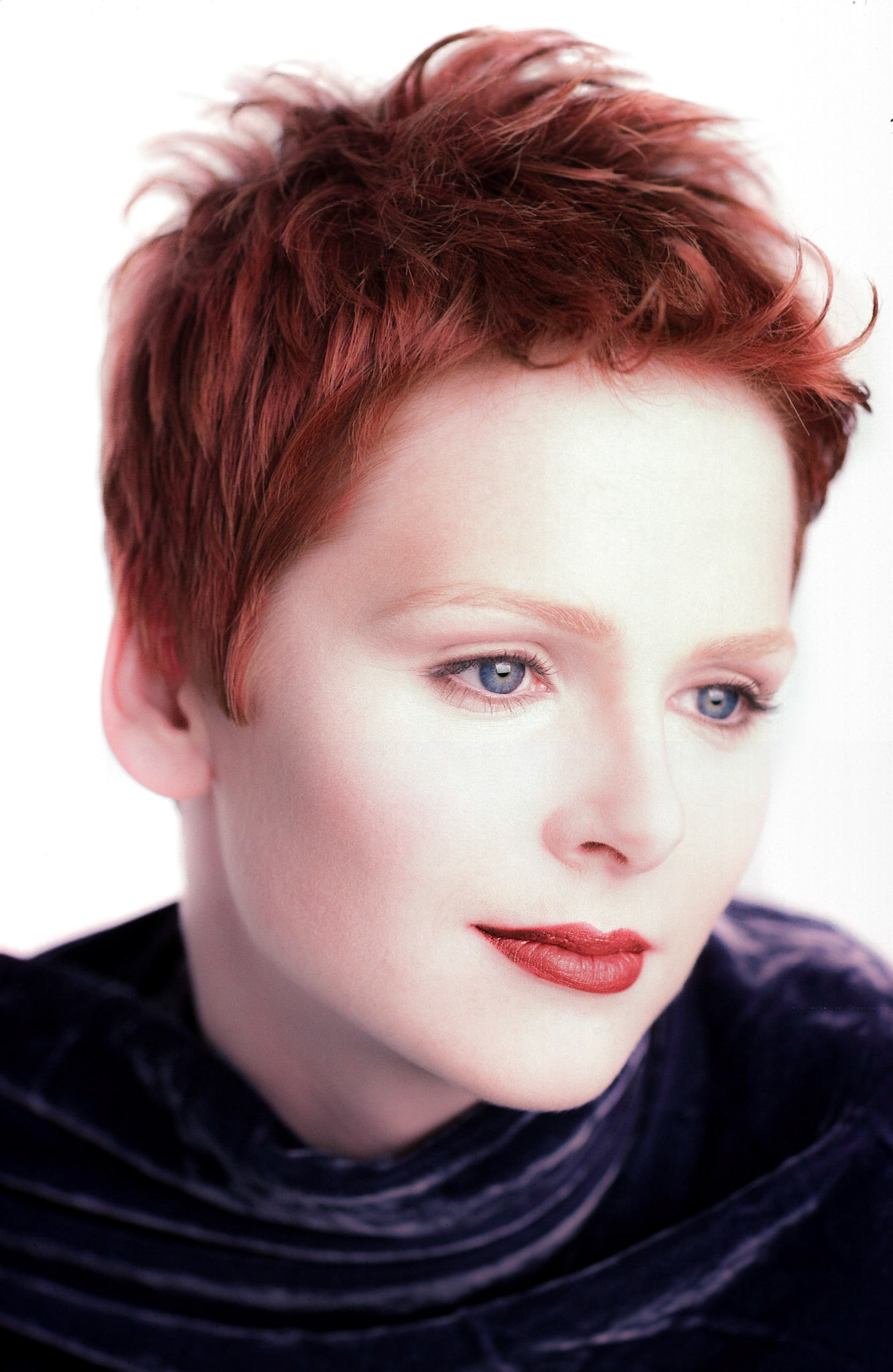 A beauty shot commissioned by a salon to illustrate their color highlighting techniques to complement clientele with subtle, extraordinary skin tones. Shot on film before Photoshop retouching and enhancements.