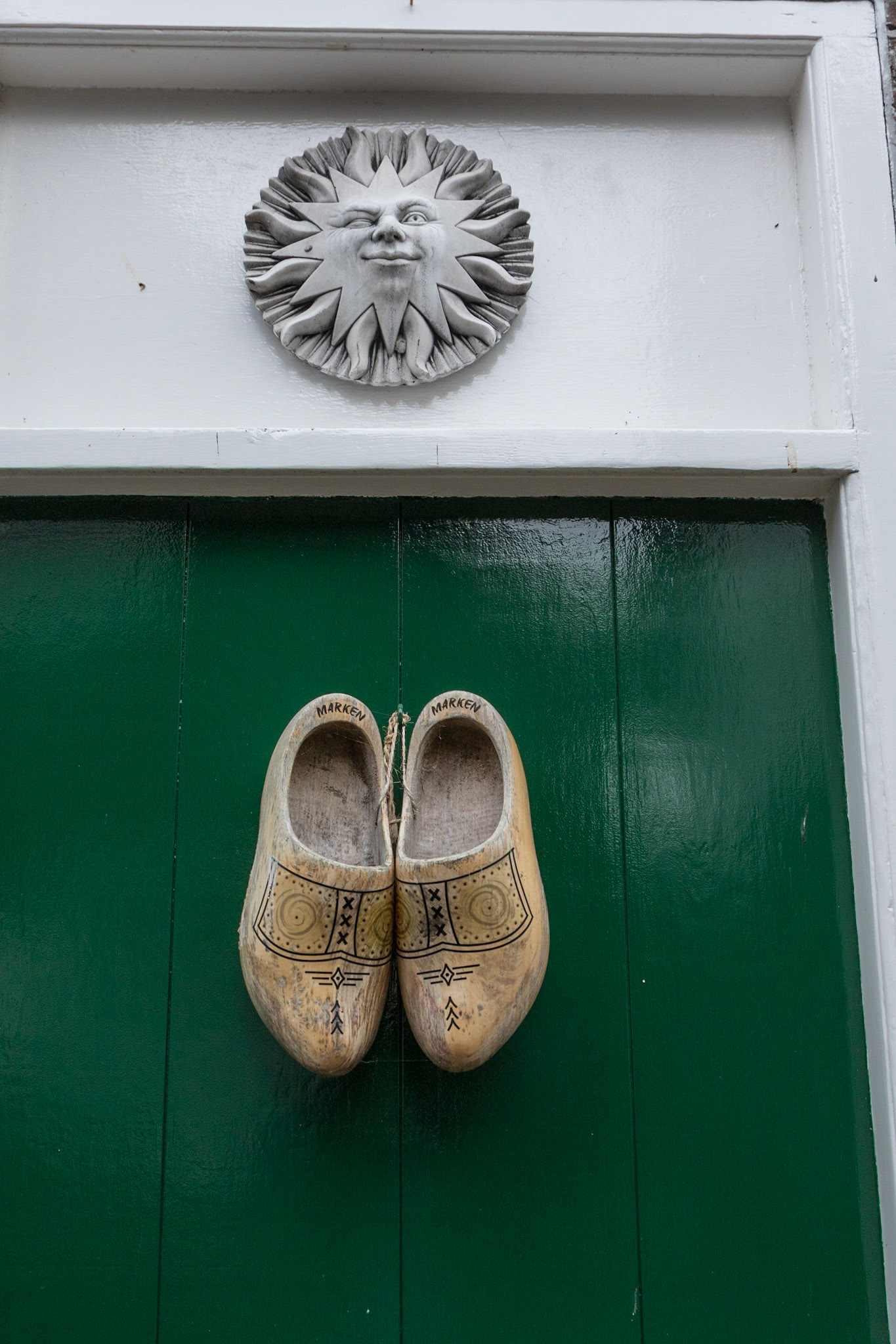 Wooden shoes on green door, Marken (near Amsterdam), Netherlands (2018)