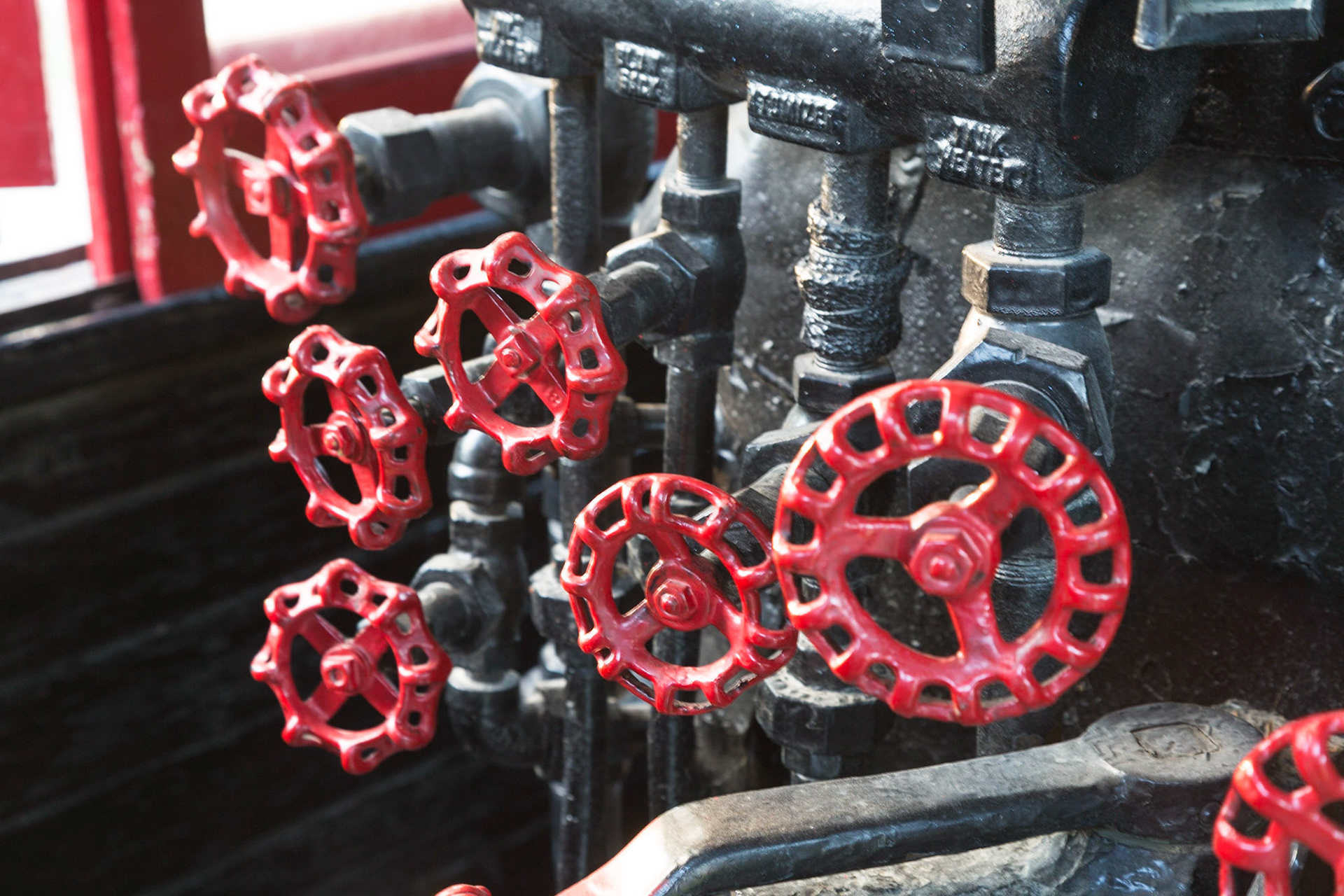 Array of valves on 1909 Baldwin  4-6-0 engine #9, Laws Museum, Bishop, CA (2016)