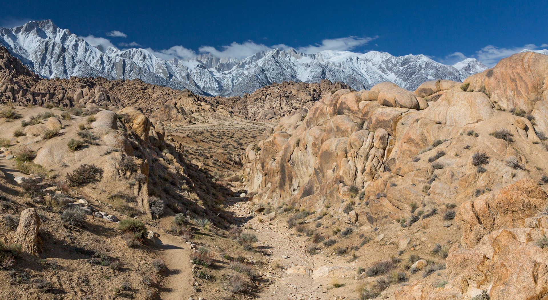 Eastern Sierra Nevada Mountain range after early spring snow from Alabama Hills with arroyo (3/2020)