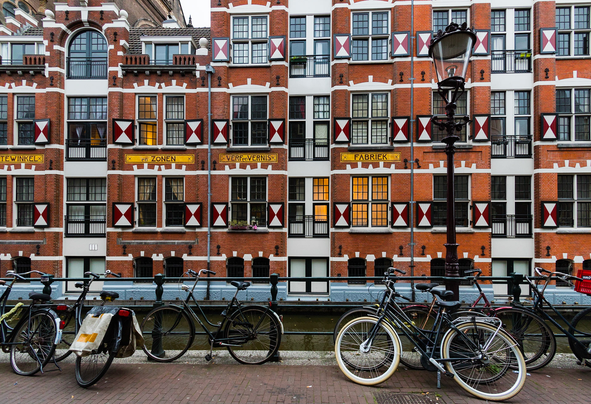 Colorful apartment building with bicycles, Amsterdam, Netherlands (2018)