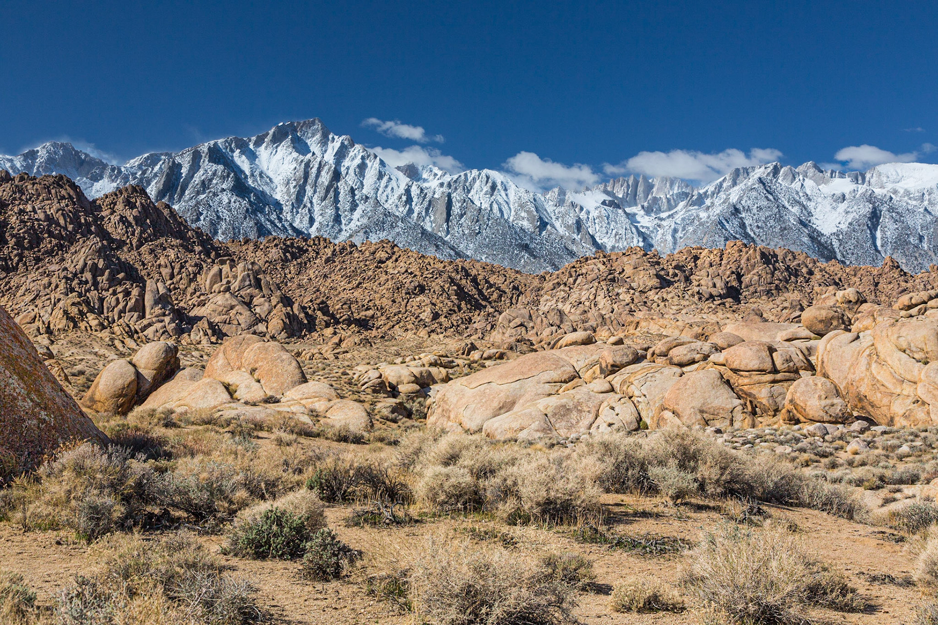 Eastern Sierra Nevada Mountain range after early spring snow from Alabama Hills with arroyo (3/2020)