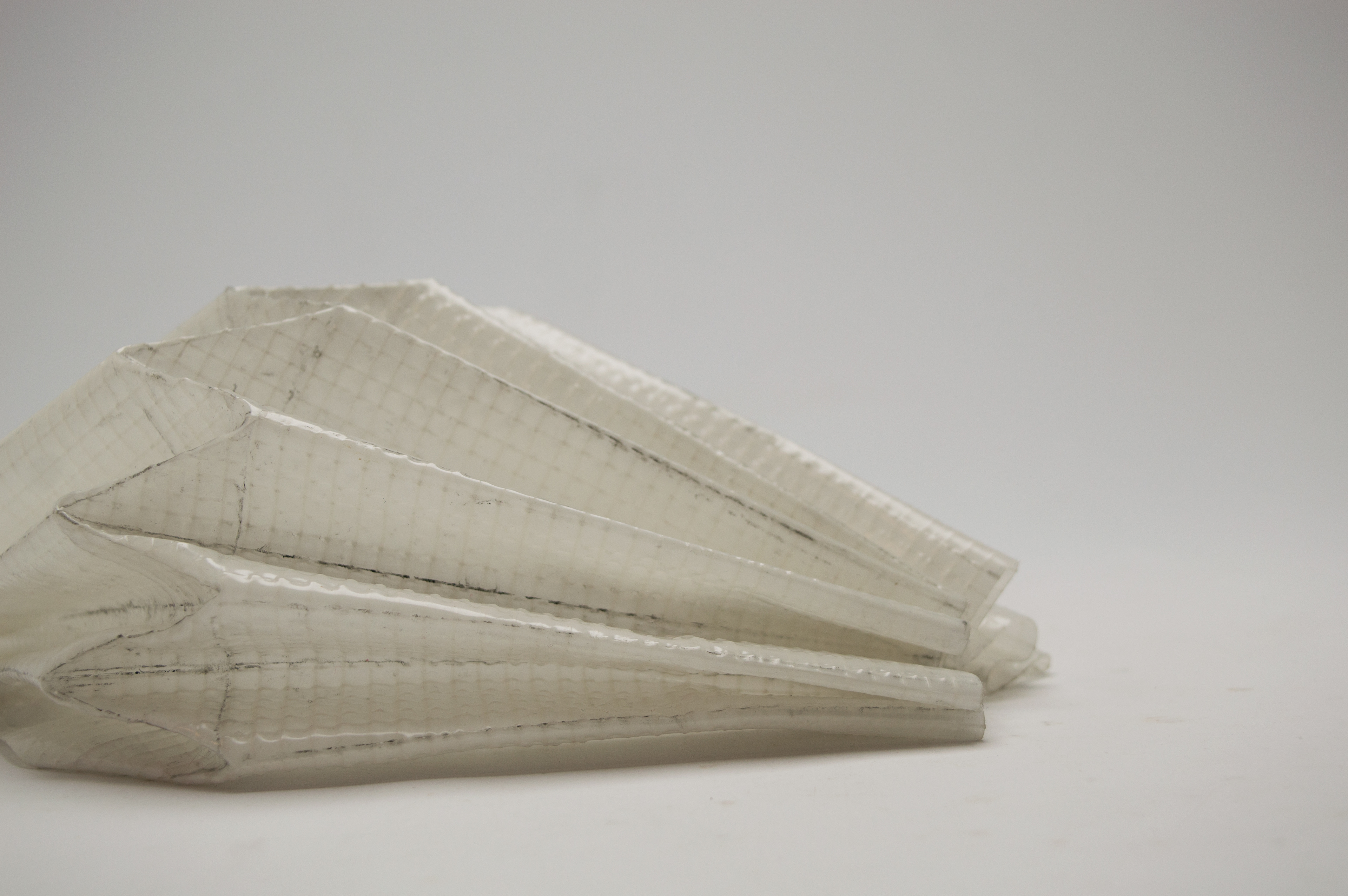 Ironed plastic textile