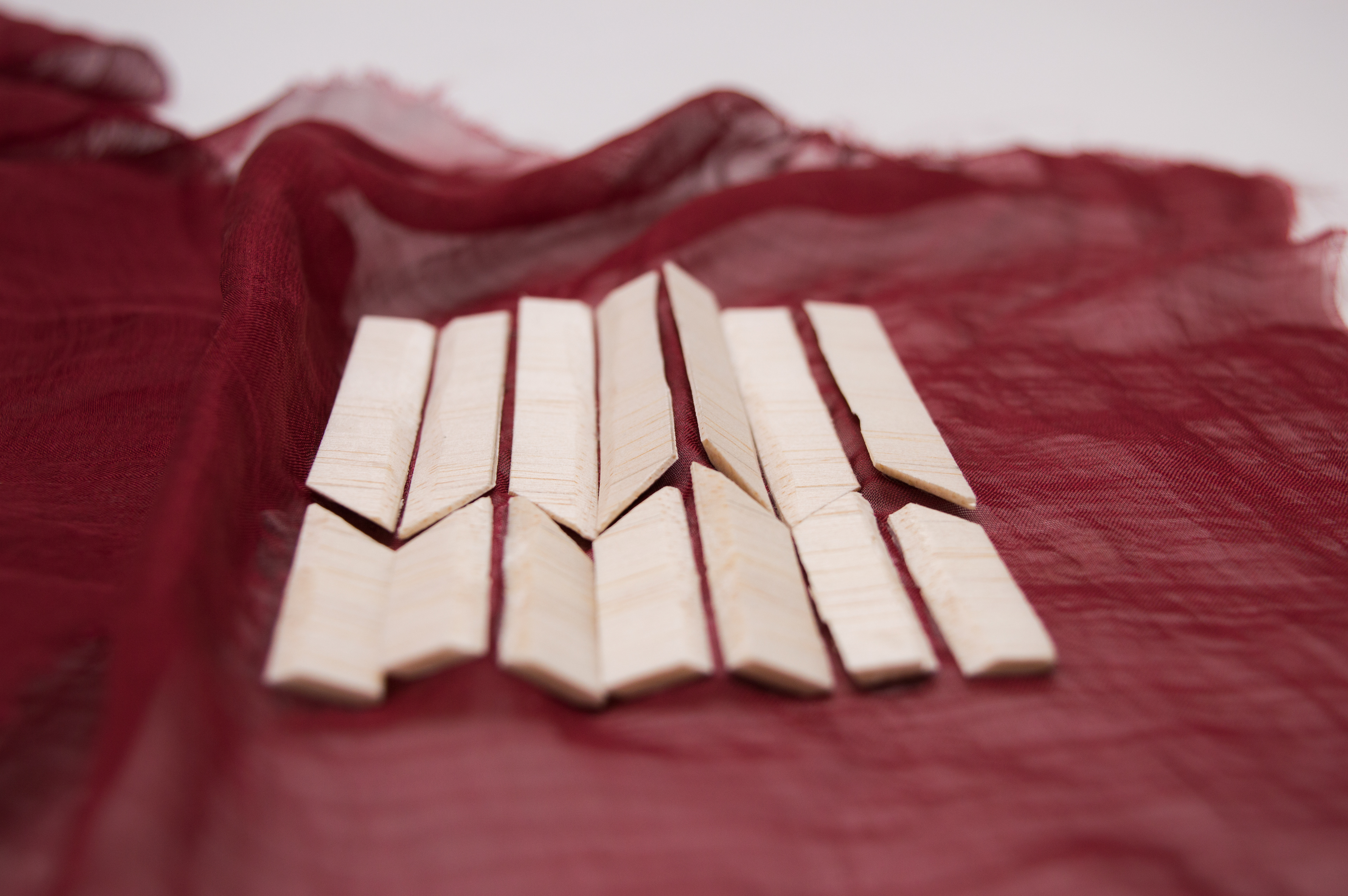 Light textile hardened with wood