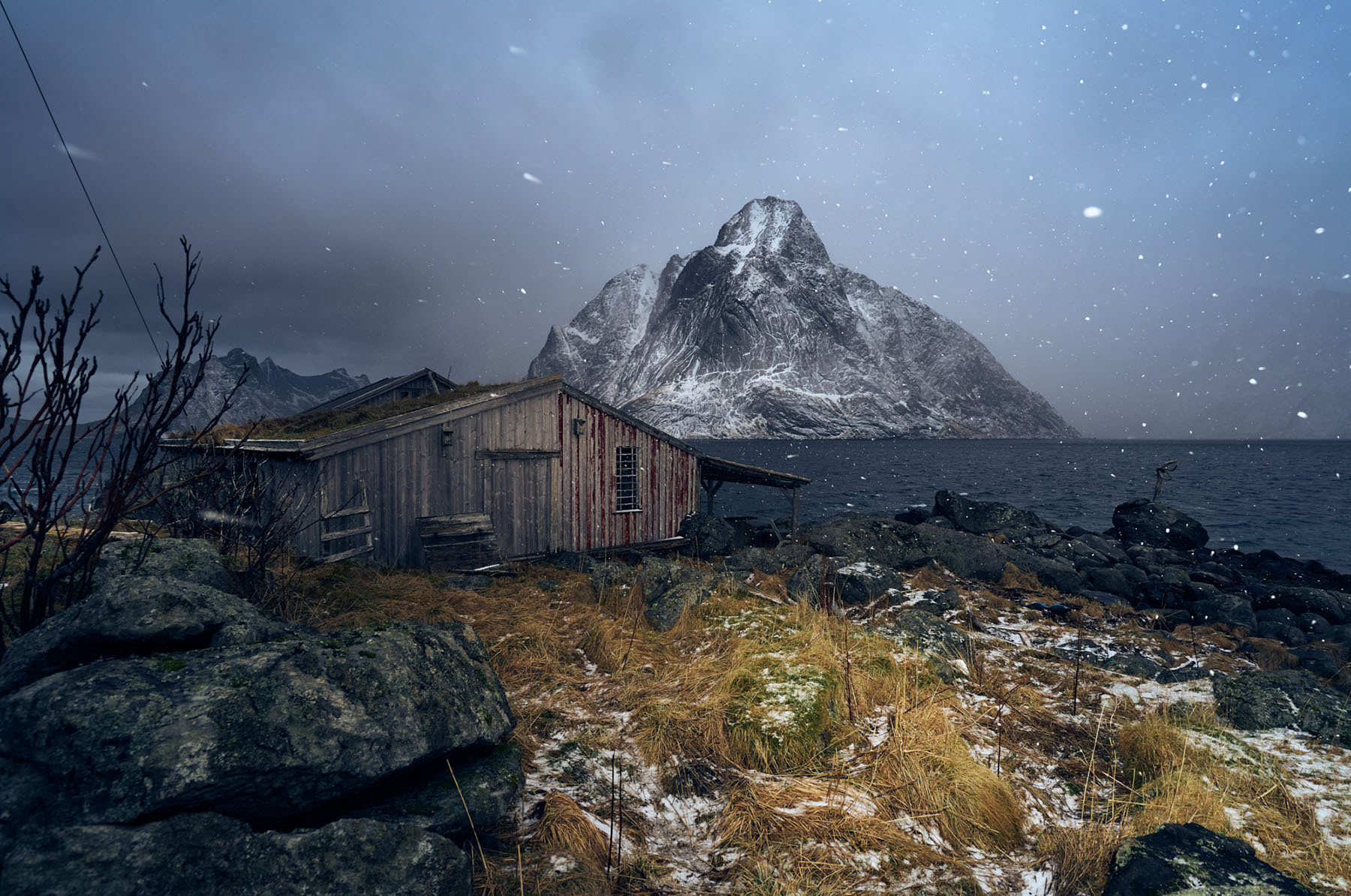 Reine fishing village on Lofoten Islands during snow.