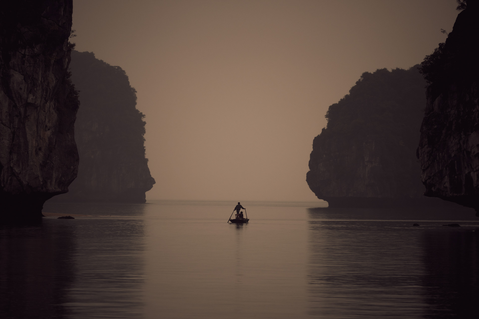 Vietnam. Fisherman, Halong Bay by Nick Kontostavlakis