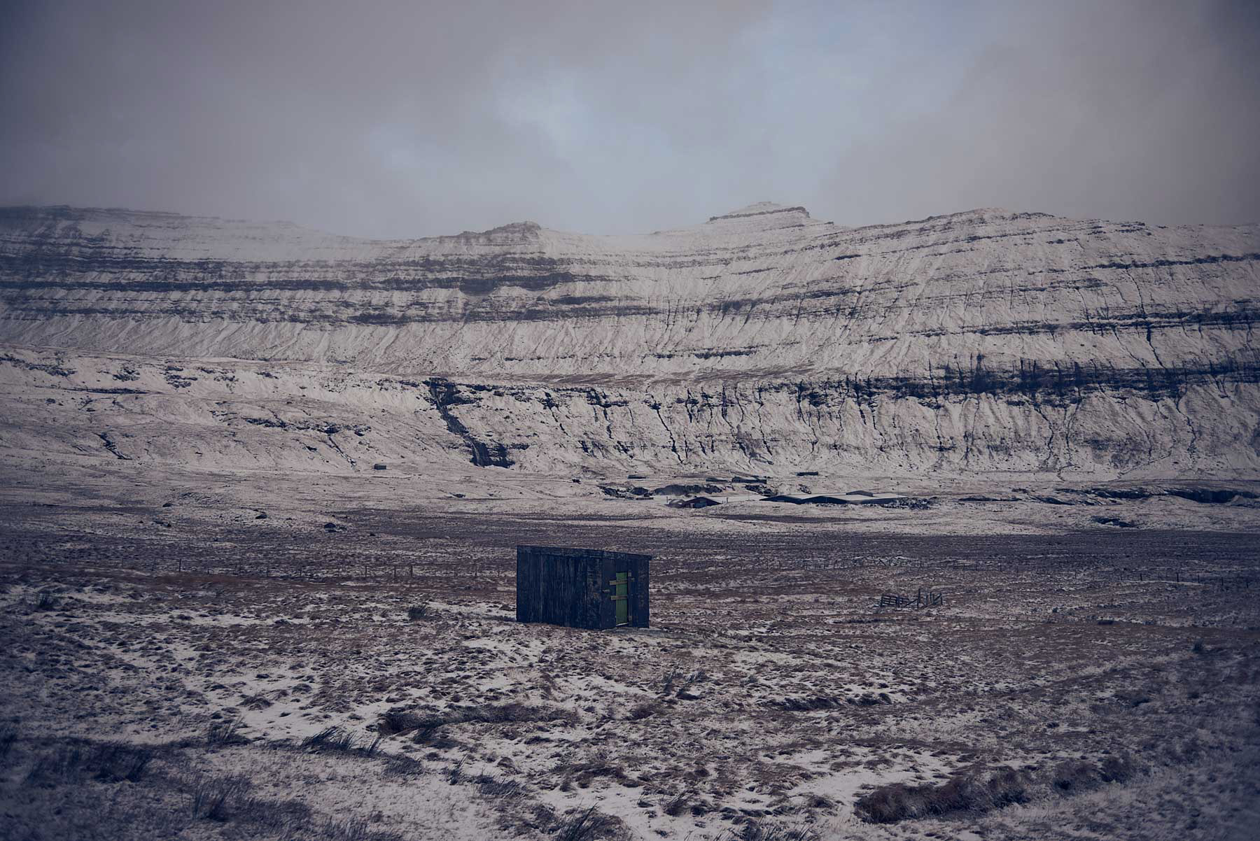 a lonely hut shot in Faroe Islands during winter.