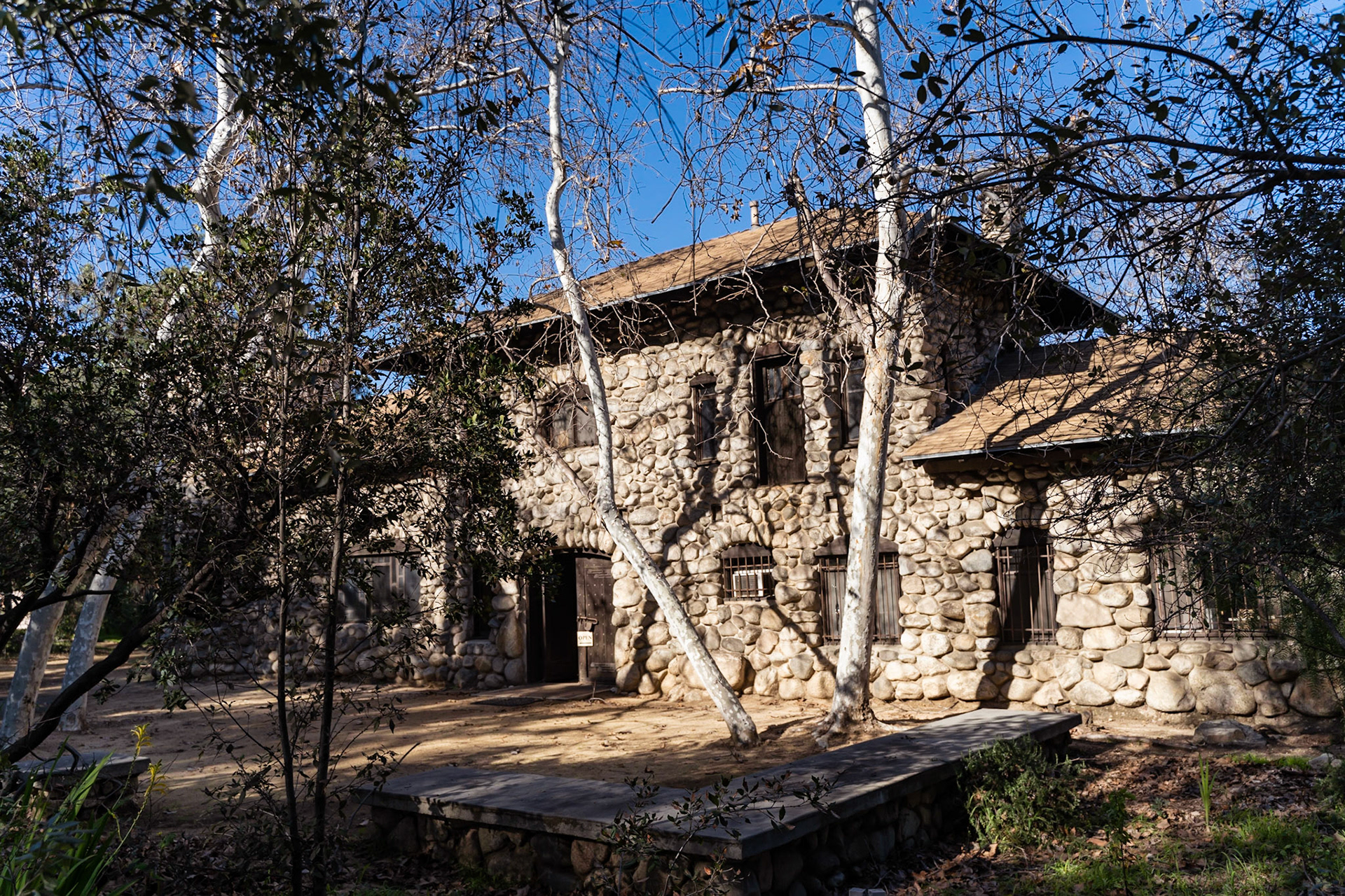 The Lummis House is a rustic American stone craftsman house built by Charles Lummis.  Also known as El Alisal, meaning "alder grove", it was built over a period of 13 years starting sometime around 1895-1897.  Charles Lummis lived here and tended to the nearby Southwest Museum, which he helped found in 1907.  It's a little gem of a place to visit, and admission is free.  The property is located at 200 E. Ave. 43, Los Angeles, CA 90031.  It is operated by the City of Los Angeles, is a Los Angeles Historic-Cultural Monument and is on the National Register of Historic Places.  Photo by Ming Lo