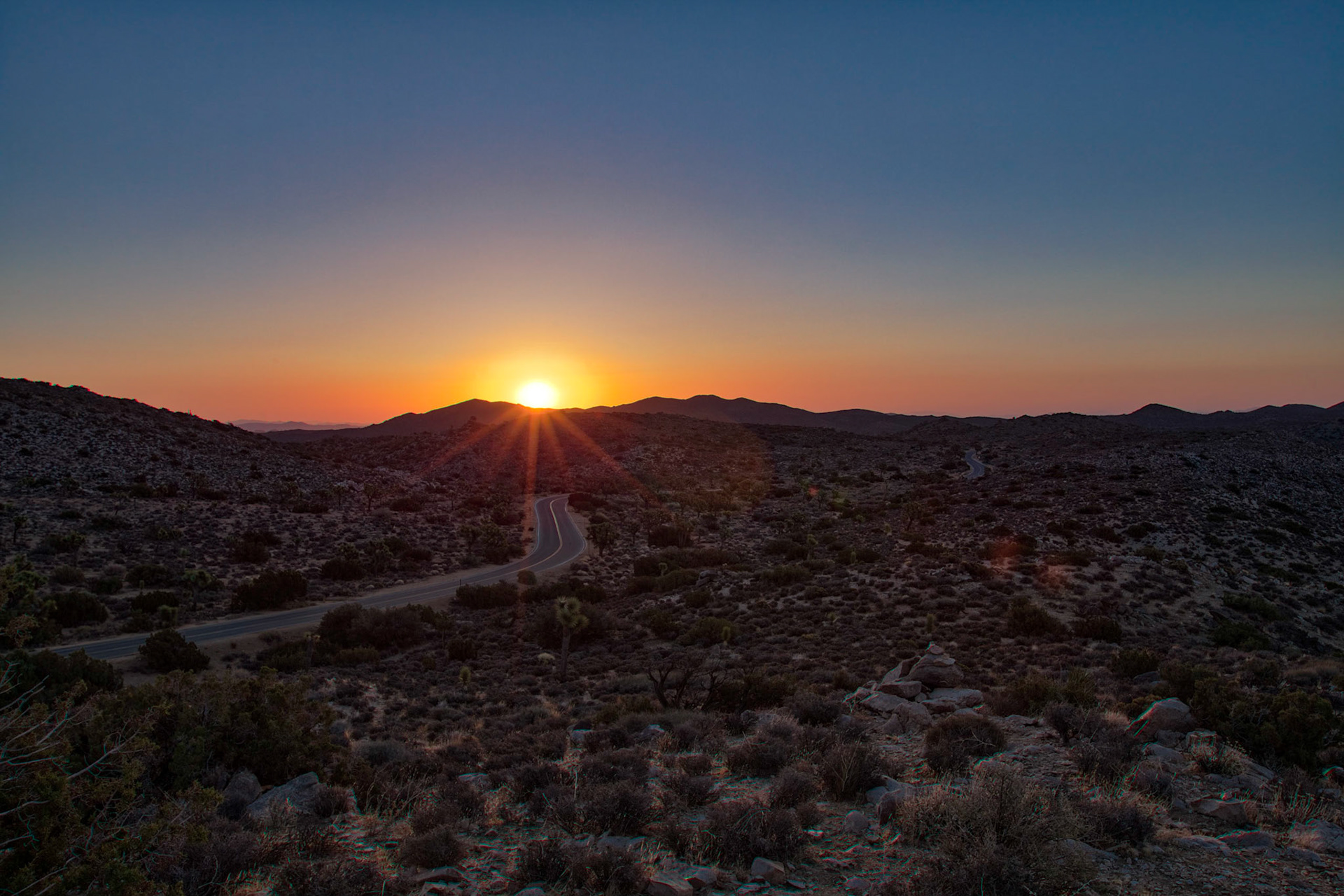 Photographed on Sunday, 13, 2018 at 552am.  There's not much post on this shot, other than saturating the colors a bit and boosting the contrast.  Wanted to give an realistic sense of dawn at Joshua Tree.  1/50s at f/11, ISO 100.  Canon 5d MII, 24-70 f2.8 lens at 31mm.  3-shot +/- 2 stops HDR.