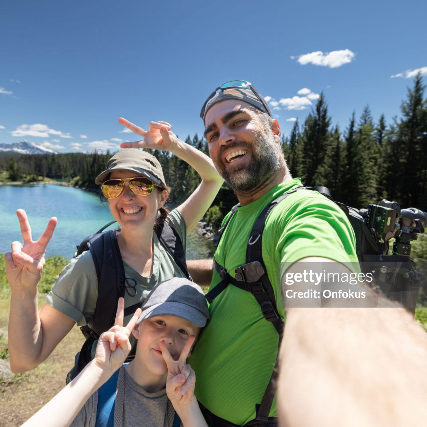 Happy Family Taking a Selfie at Five Lakes Hiking Trail, Jasper, Alberta, Canada
