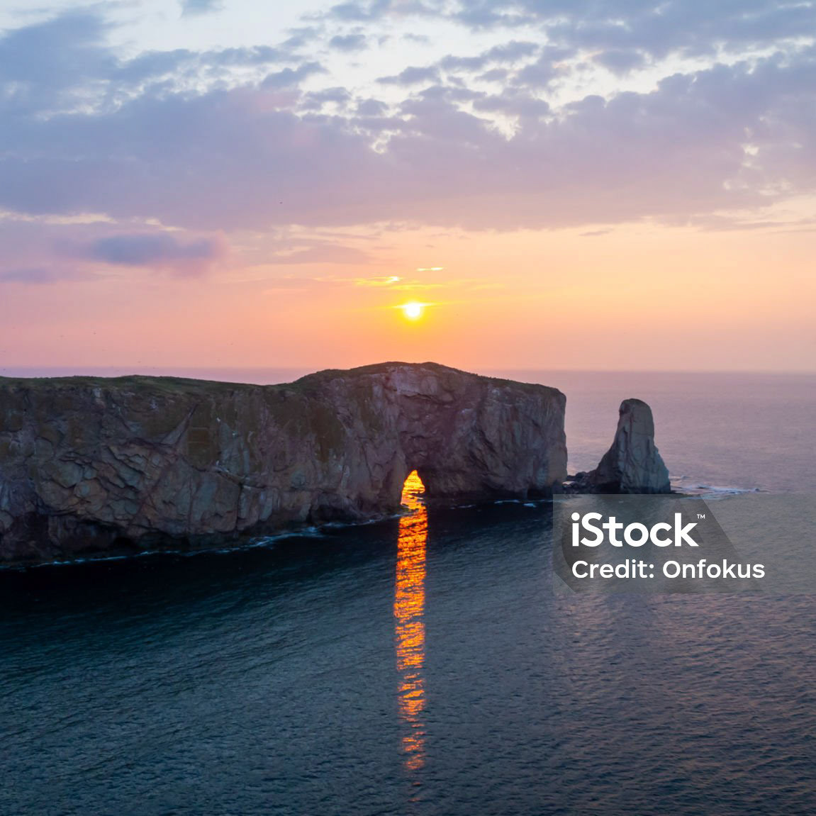 Aerial view of the Rocher Perc? (Perce Rock) in the city of Perc? in Quebec, Canada, at Sunrise