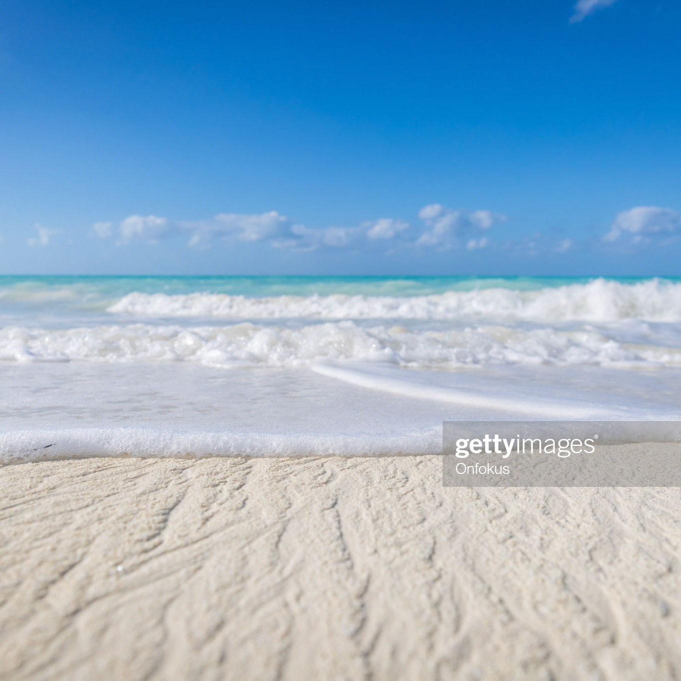DSLR picture of an idyllic tropical sand beach on a beautiful day in Cayo Coco, Cuba.