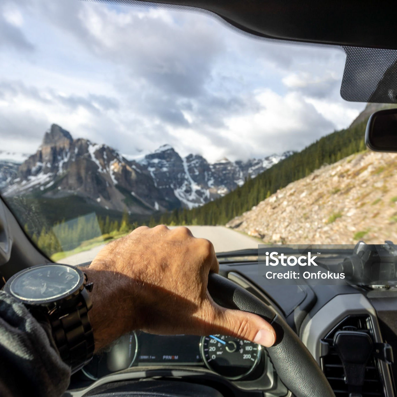 POV Video of Car driving on Empty Road Towards Moraine Lake in Banff National Park, Canada