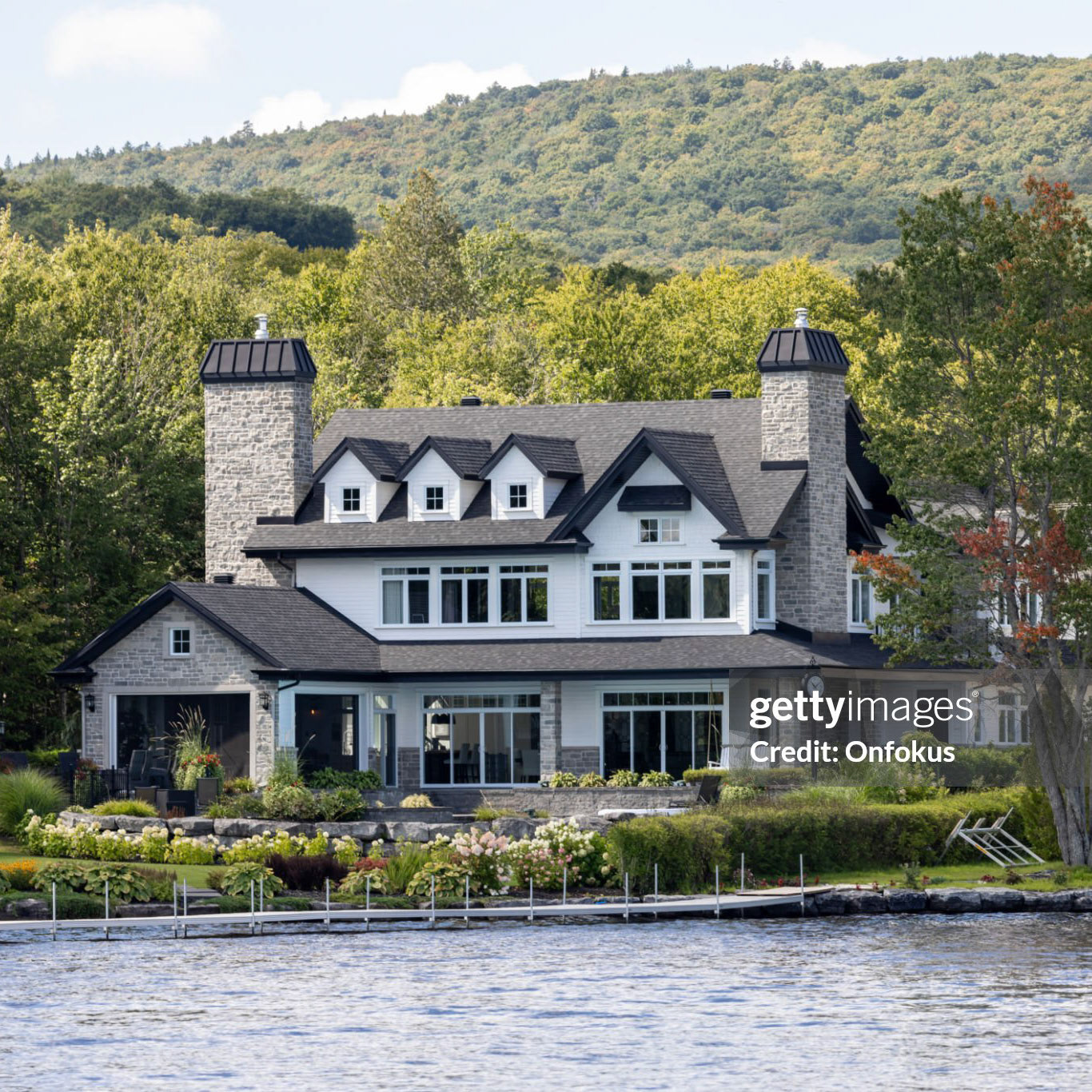 Lac St-Joseph, Quebec, Сanada - August 27, 2023: Luxurious lakefront property located in Lac St-Joseph, a rich suburb of Quebec City on a sunny day of summer.