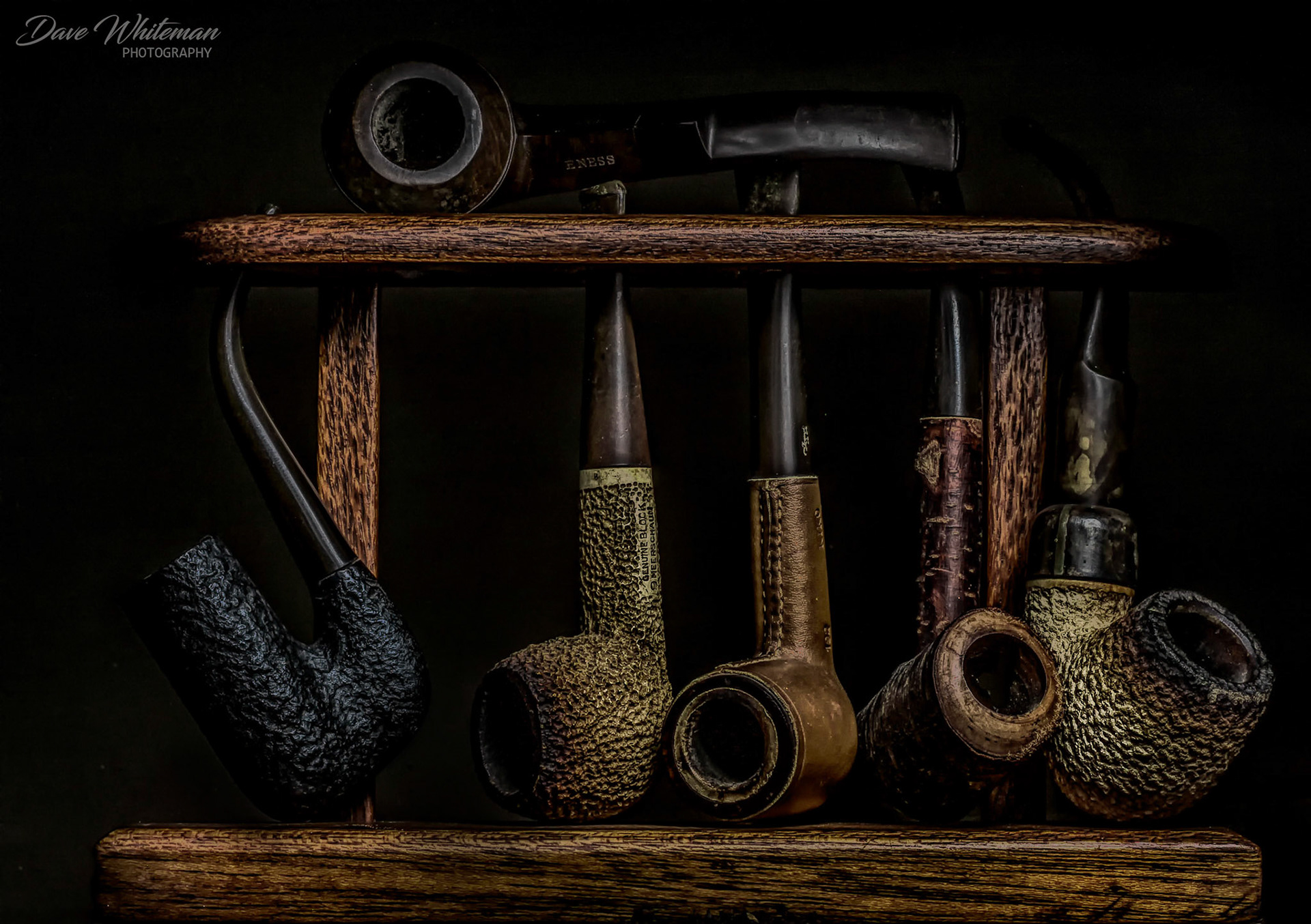 This was my Dad's pipe collection, in a pipe holder he made. They haven't been smoked for almost 50 years and will remain a treasured family heirloom.