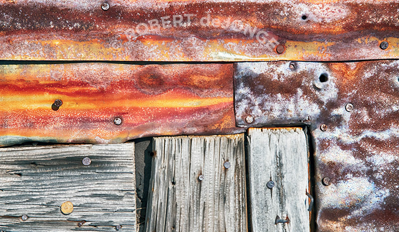 Ole Olsen farm, Metal siding, nails, rust, patched, wood