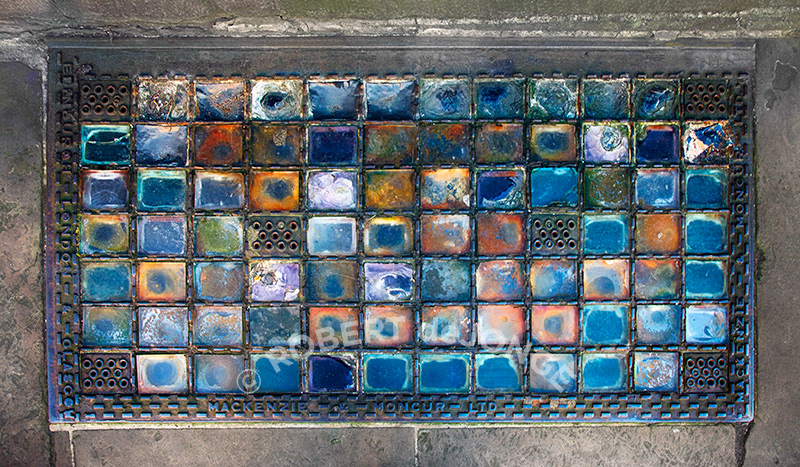 a sidewalk grate
