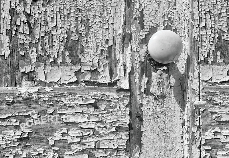 Doorknob, white paint, peeling paint, 