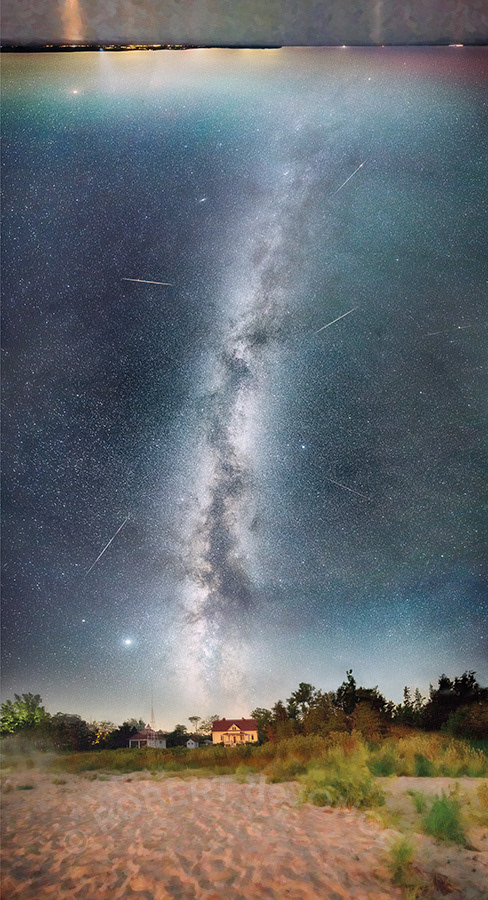 A 180 degree panorama of the night sky featuring the Perseid Meteor shower and the Life Saving Museum in Glen Haven