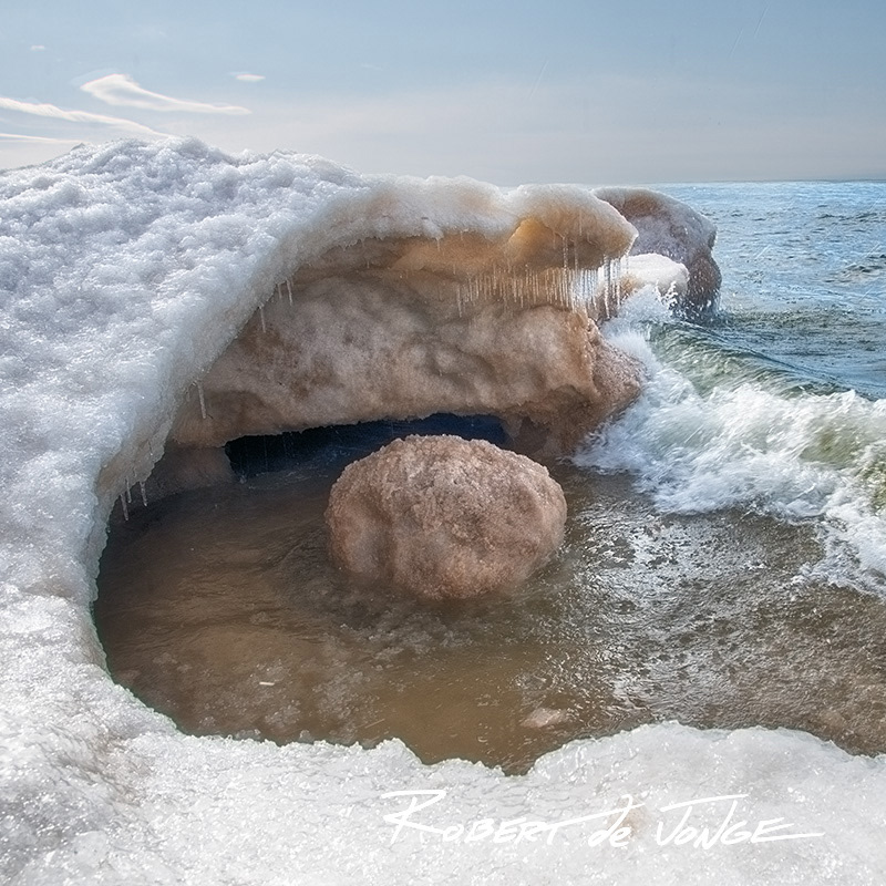 Waves form ice boulders as they grind chunks of ice against the Ice ridges on Lake Michigan