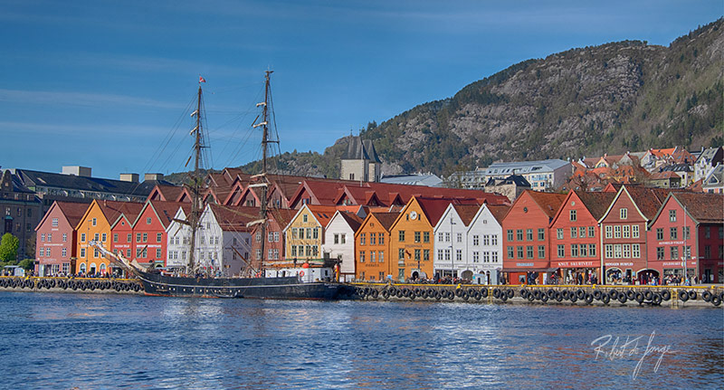 The Bryggen historic district of Bergen as a backdrop to the sailing ship Roald Amundsen