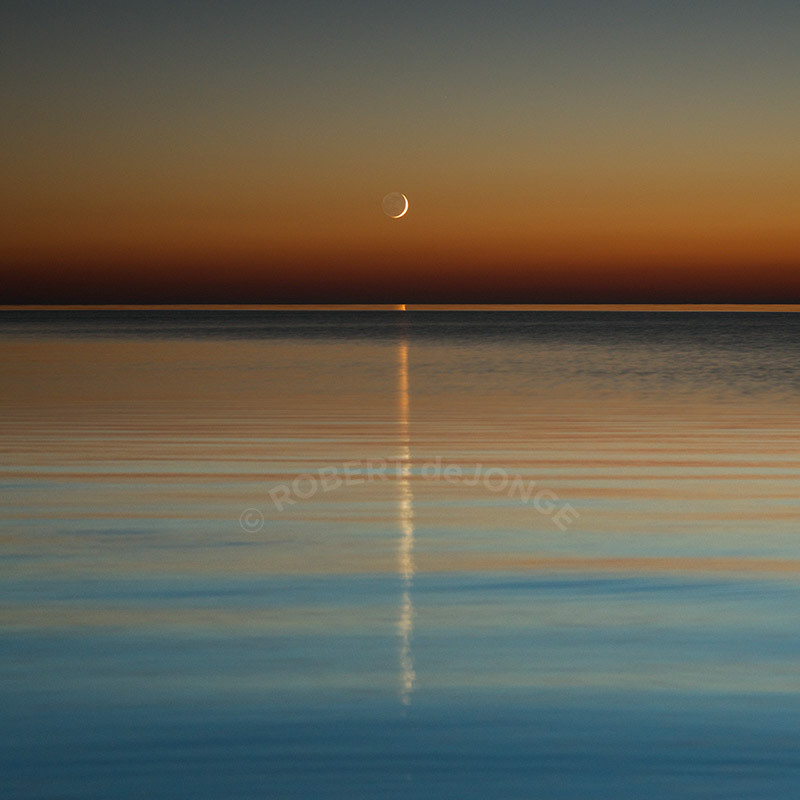 Moon rise, Crescent, evening, Lake Michigan, Northern Michigan, calm waters, reflection