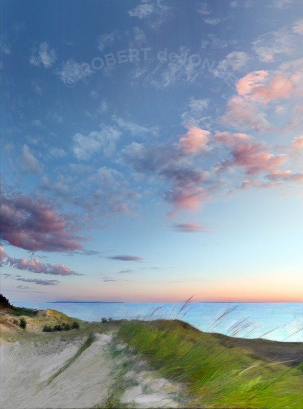 A pastel sunrise on Pyramid Point. North Manitou Island in the distance