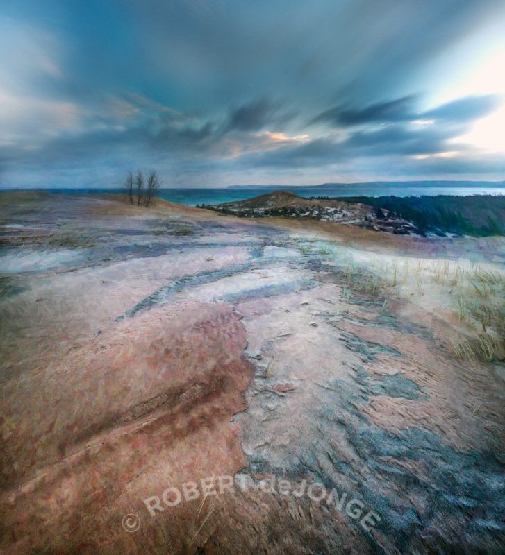 scoured dune, earth colors, painted, winter, windswept, clouds move, Sleeping Bear Point