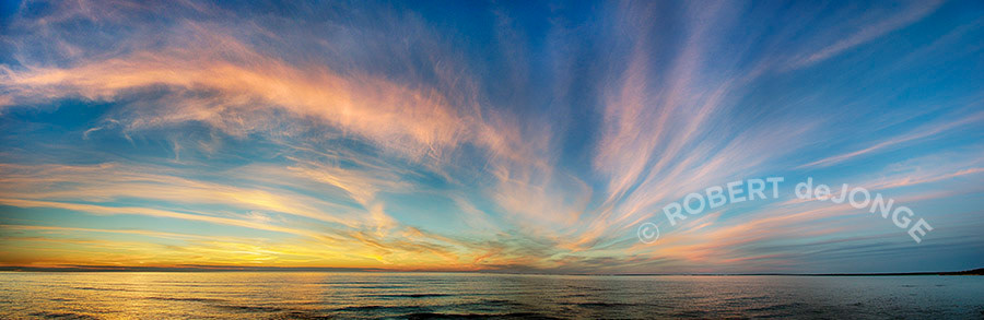 Evening sky, sturgeon Bay, Lake Michigan, painted clouds, calm water