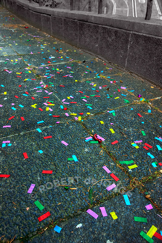 confetti left from party-goers along Princes Street