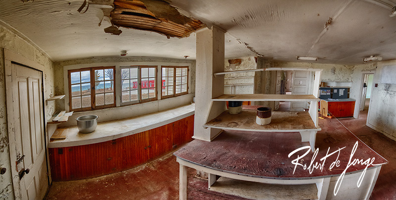 Interior view of the kitchen at the Sleeping Bear Inn prior to restoration