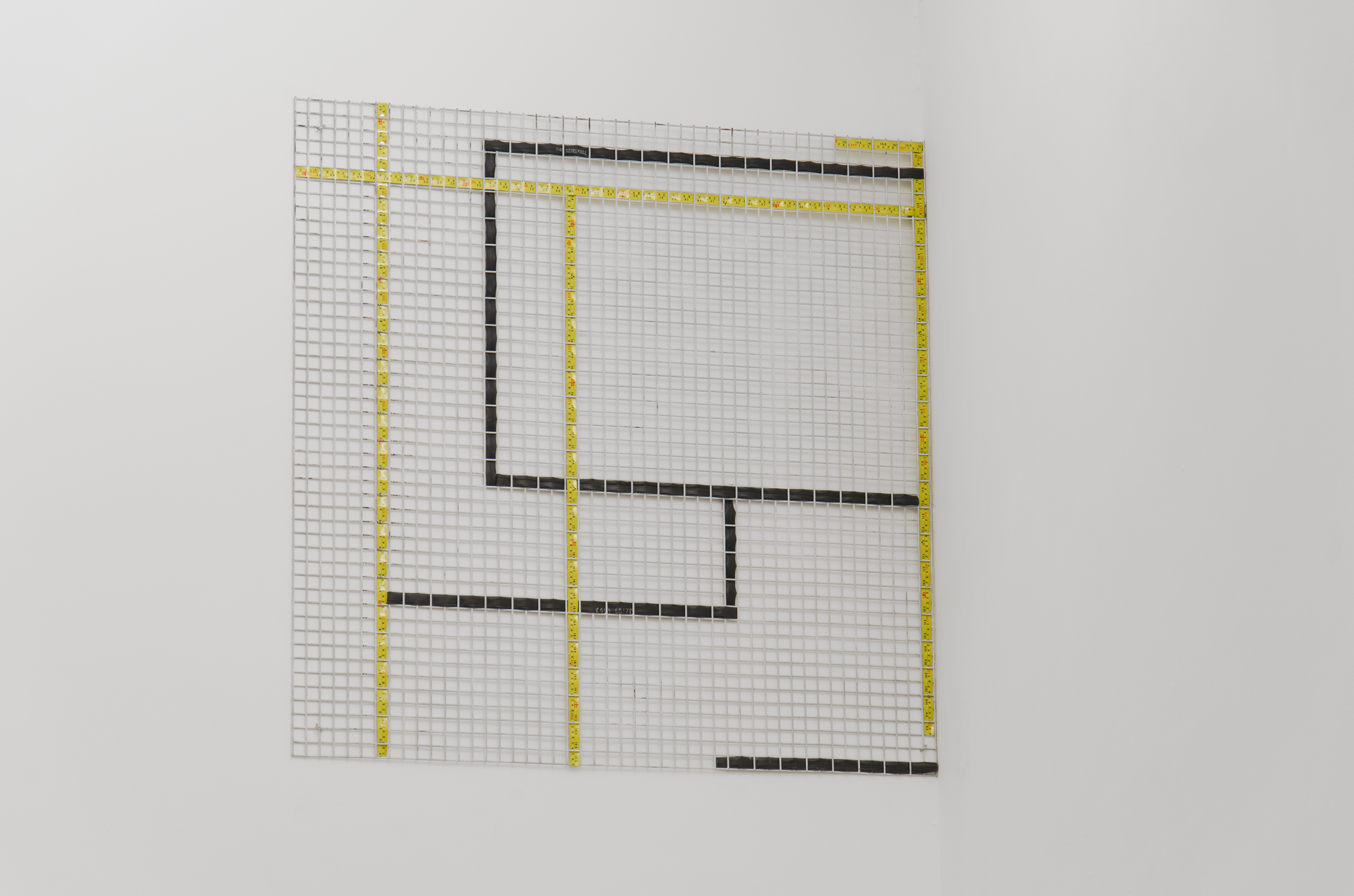 STEEL GRID; Natascha Young, 2013; steel, tape measure, inner tubing; 120 × 120cm