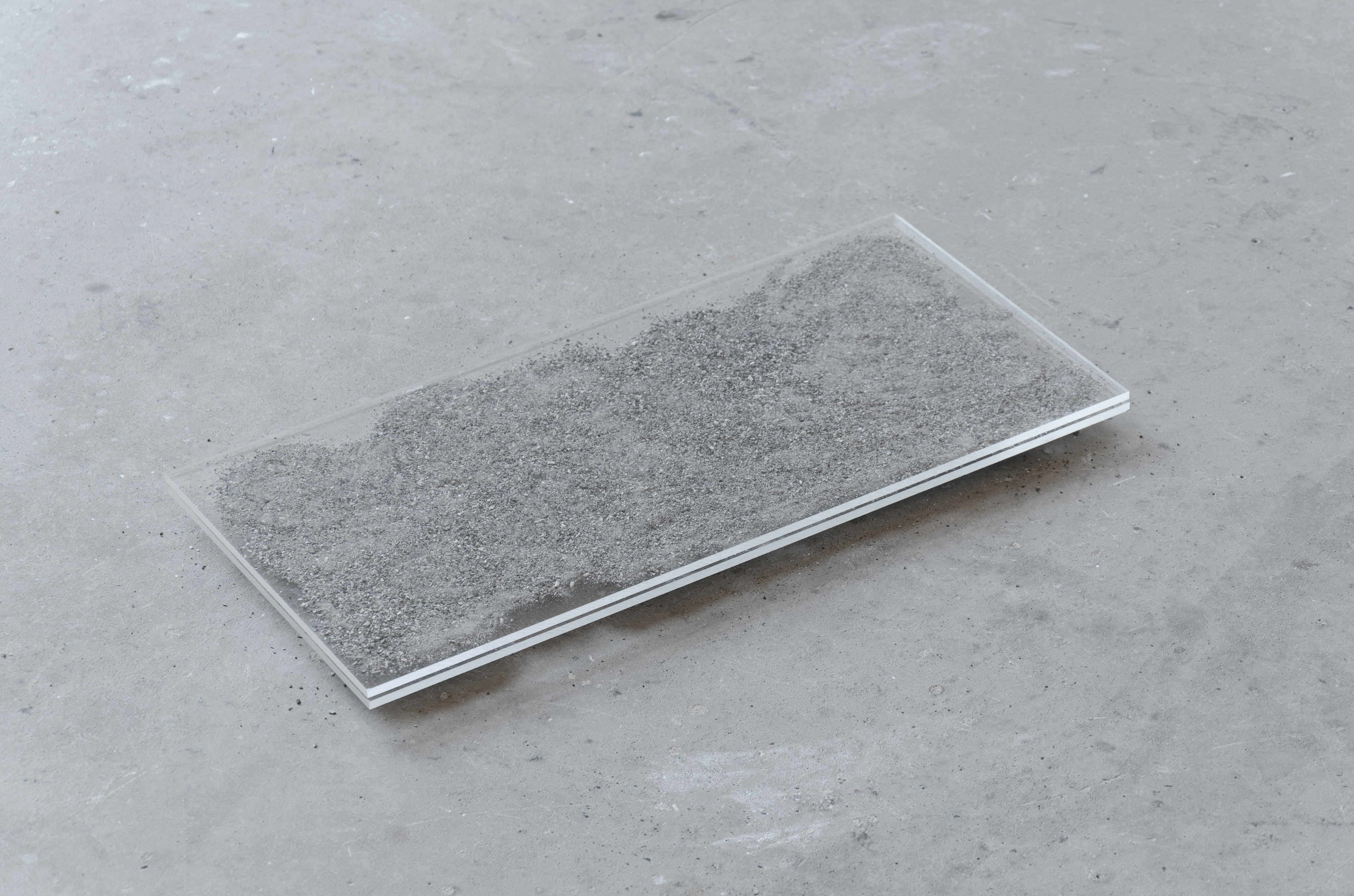 TRANSPARENT BURIAL; Liv Preston, 2014; Perspex, G clamps, canine ashes (Lewis); 45.5 × 21.5cm